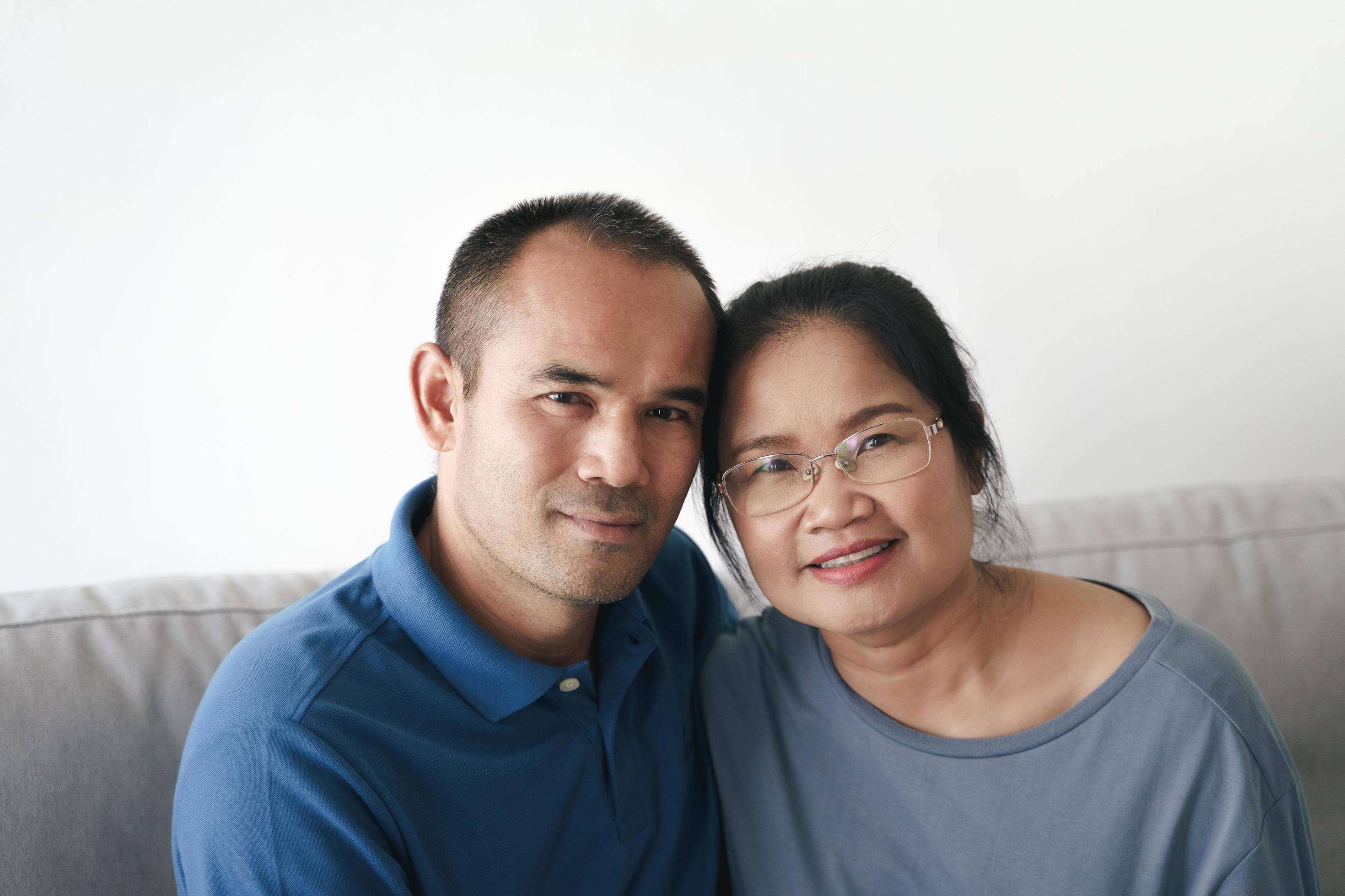 Portrait of Asian mature couple sitting