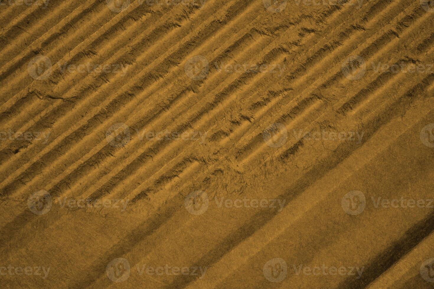 abstract brown paper luxury vintage futuristic texture with glossy elegant crack texture on brown. photo