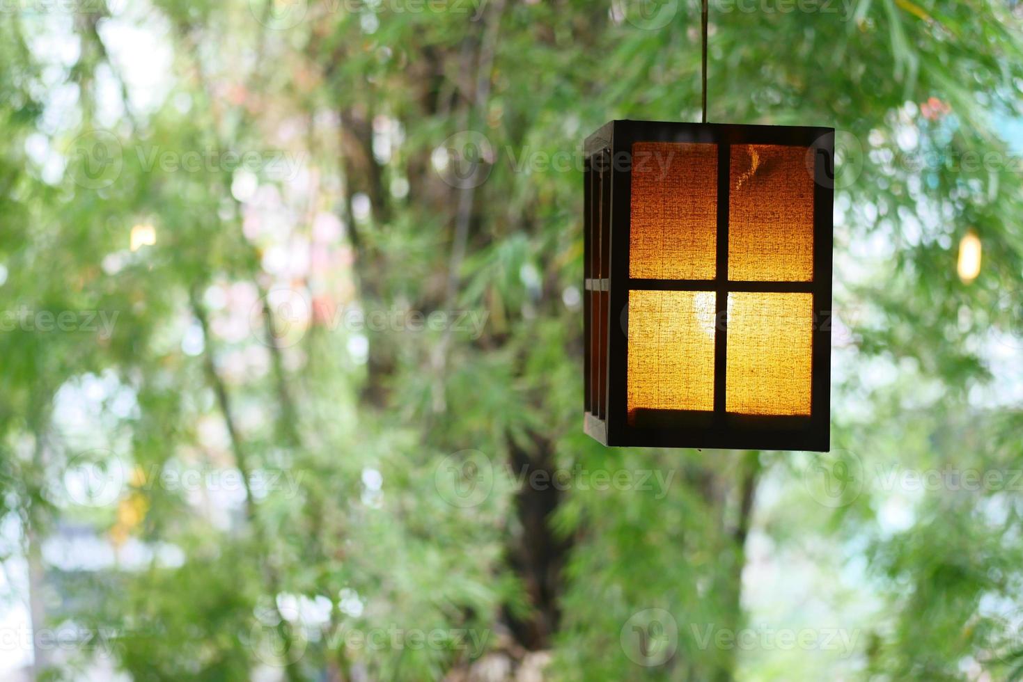 a glowing lamp in a nature with copy space photo