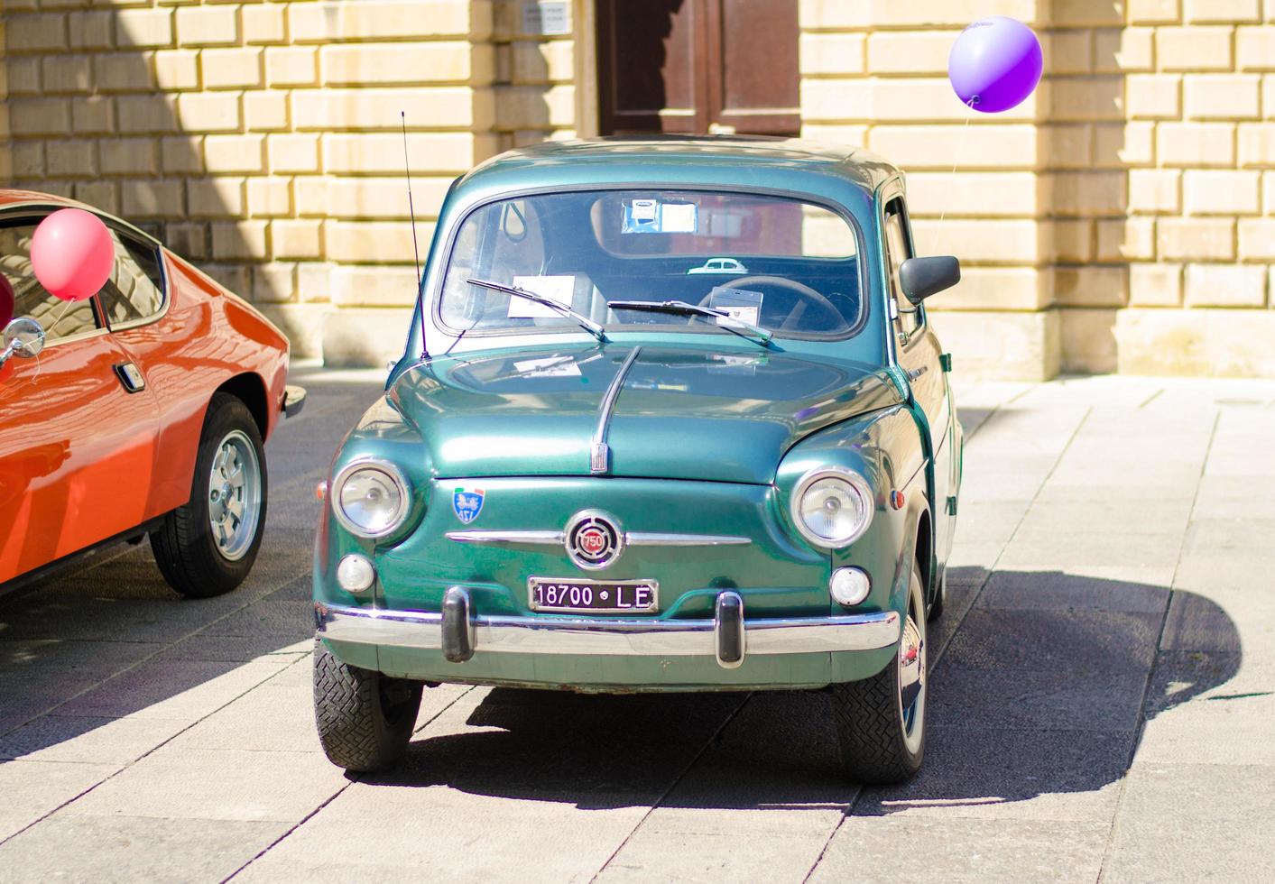 Lecce, Italy - April 23, 2017 Vintage classic retro automobiles cars in Italy photo