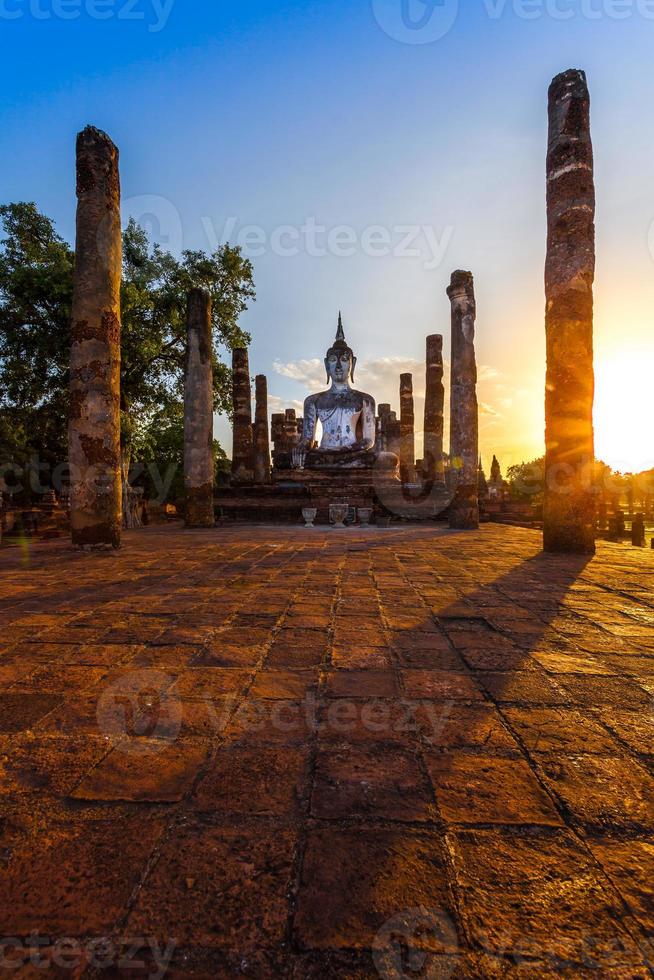 Silhouette Buddha Statue in Wat Mahathat Temple in Sukhothai Historical Park, Sukhothai Province, Thailand . photo