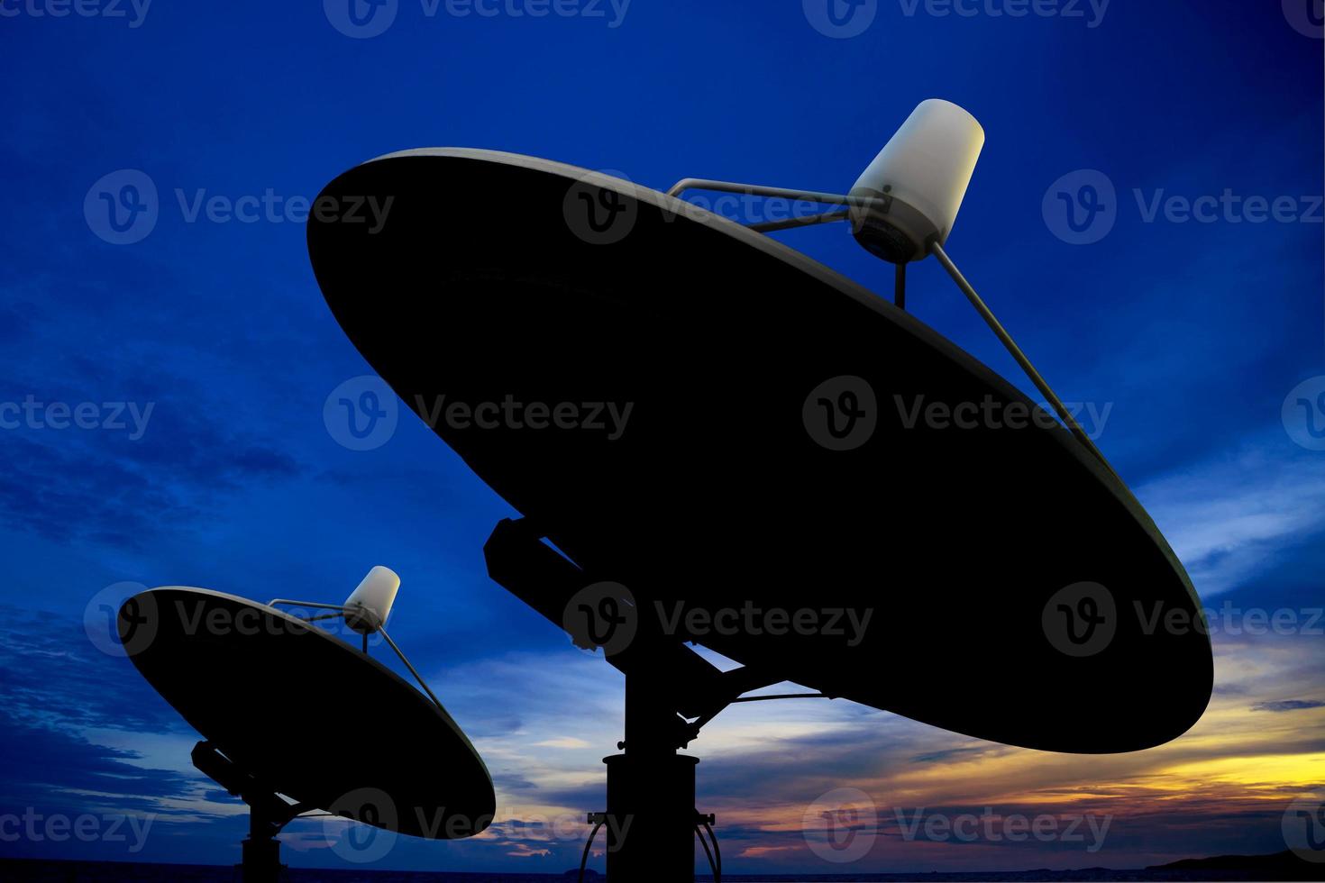 Satellite antenna in twilight photo