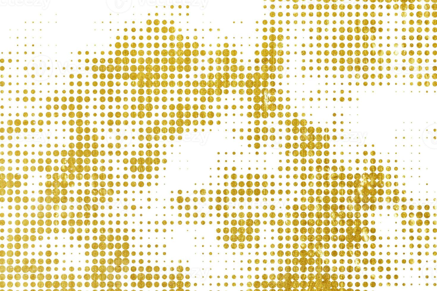 Abstract golden halftone texture. Grunge background of gold dots. photo