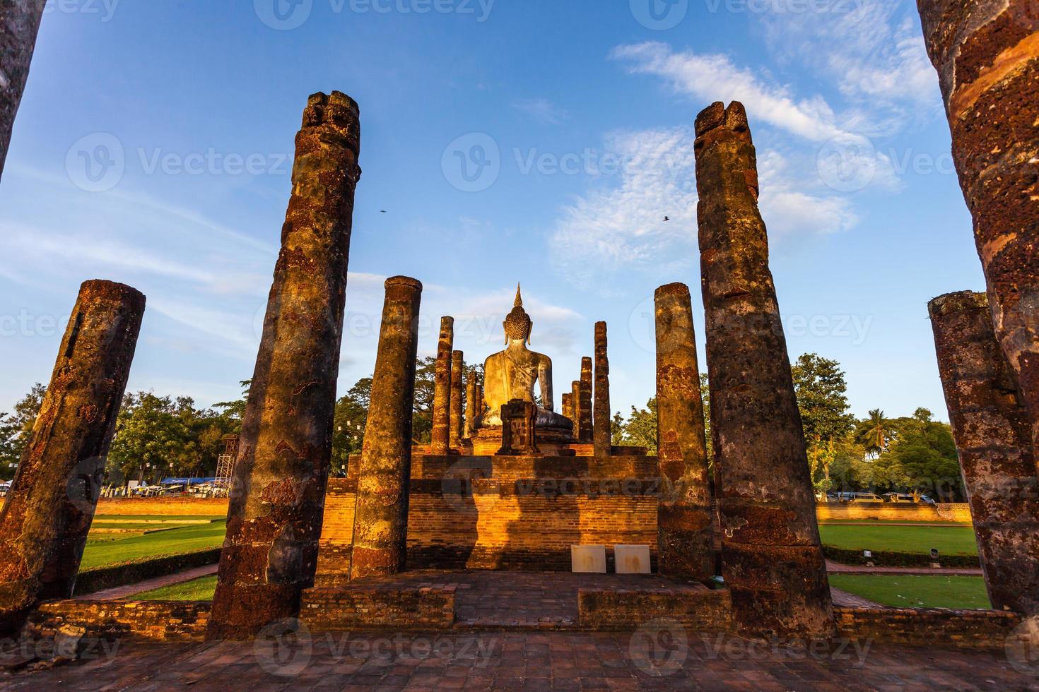 Silhouette Buddha Statue in Wat Mahathat Temple in Sukhothai Historical Park, Sukhothai Province, Thailand . photo