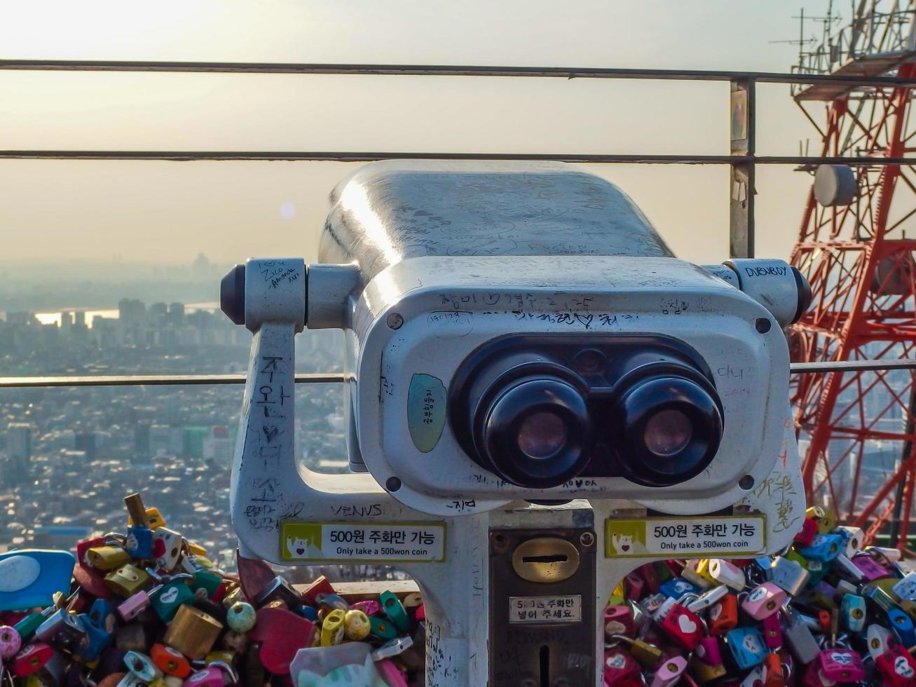 binoculars on Namsan Tower, also known as North Seoul Tower, is a famous landmark in Seoul, South Korea. Photo taken March 07, 2014 in Seoul, South Korea.