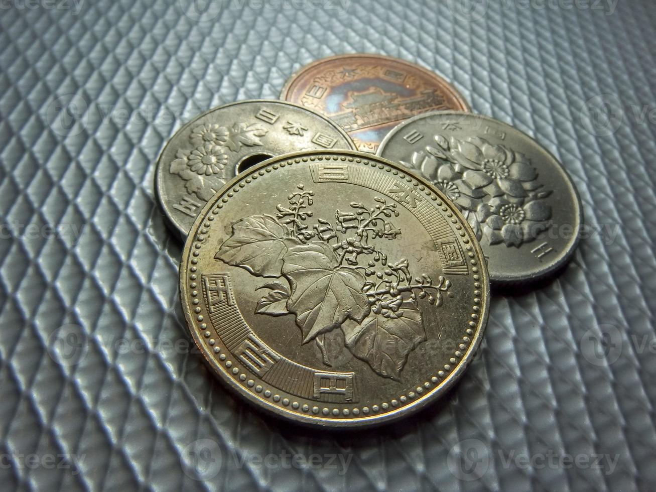 dinero japonés, moneda de plata, yen foto