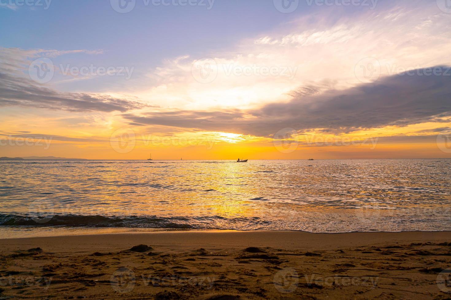 beautiful tropical beach and sea with twilight sky photo