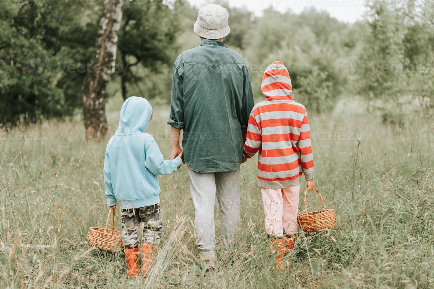 family mushrooms pickers photo