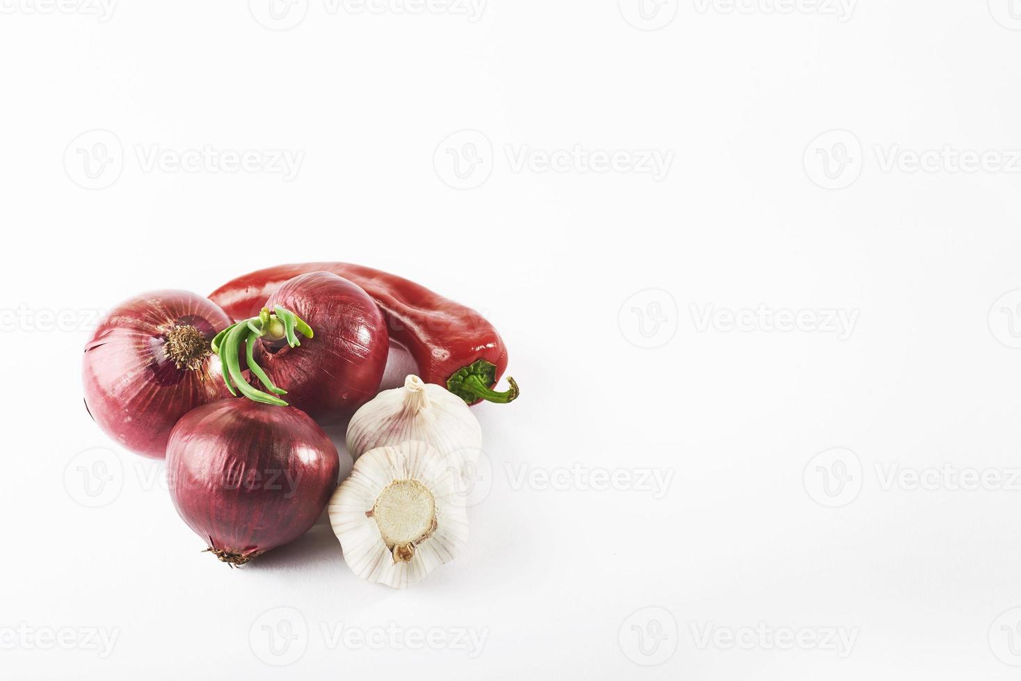 blue onion garlic and hot red pepper isolated on white background photo