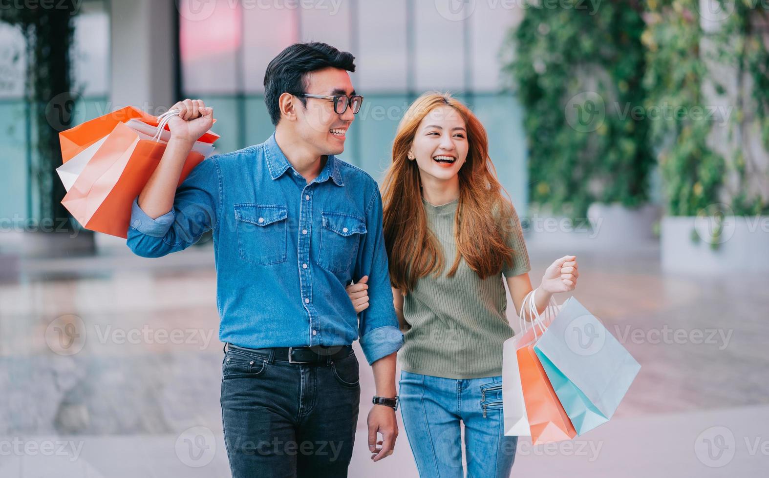 Asian couple shopping at the mall photo