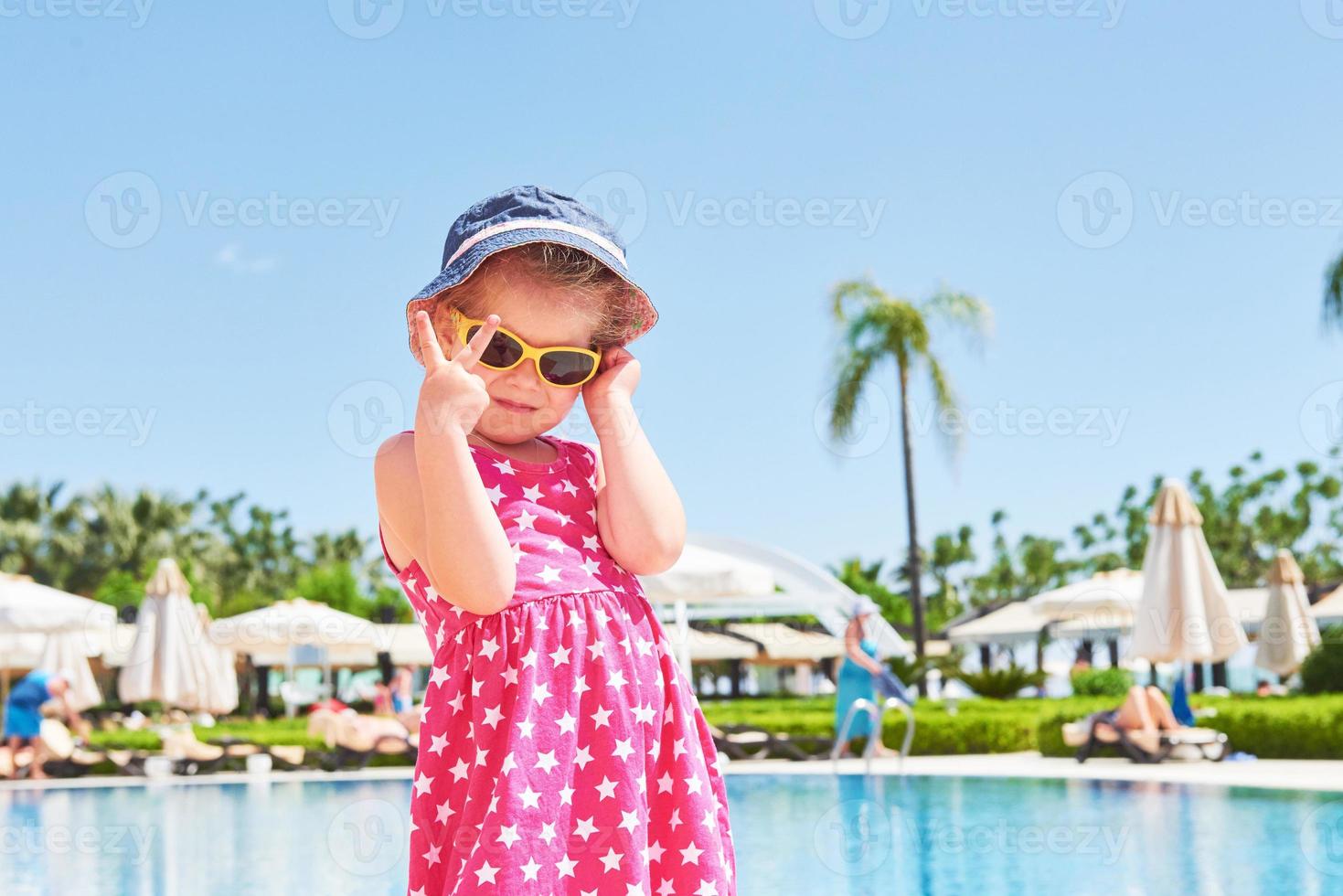 Portrait of a happy girl outdoors in summer day. Amara Dolce Vita Luxury Hotel. Resort. Tekirova-Kemer. Turkey. photo