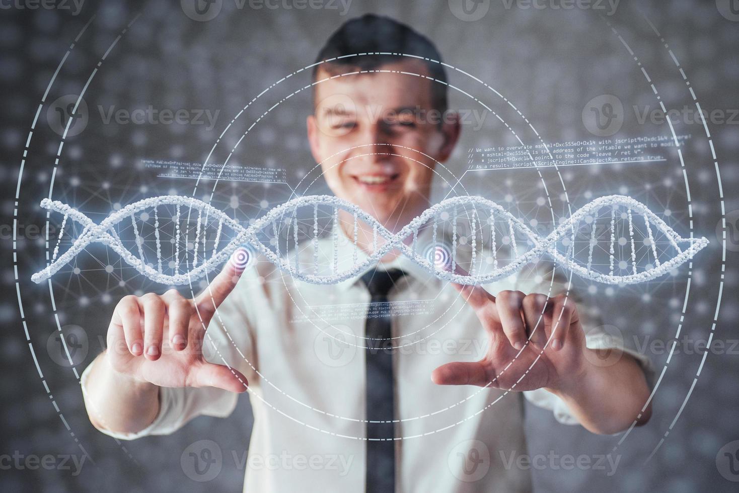 Happy man on a black background in the studio. Innovative technologies in science and medicine photo