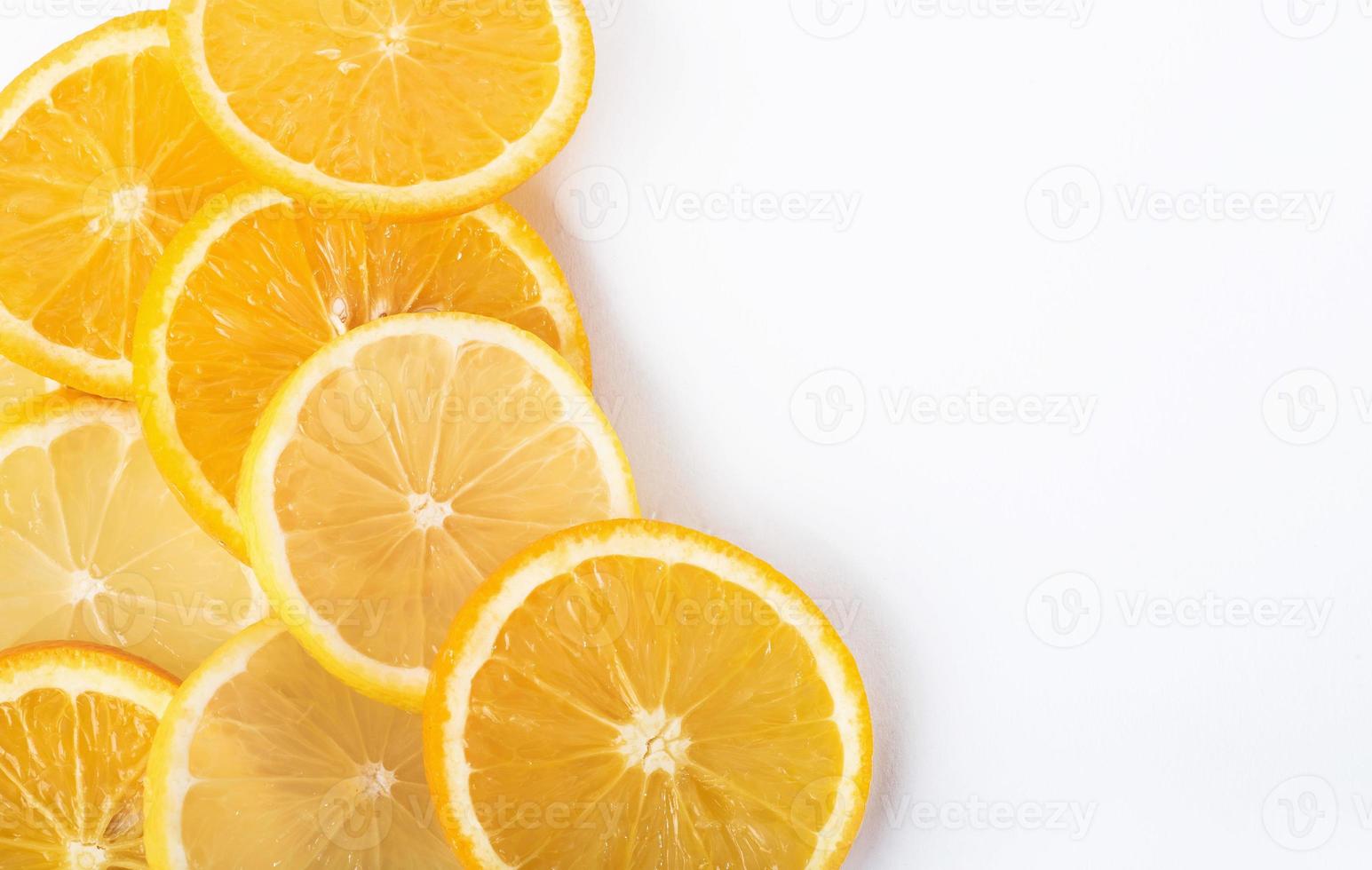 slices of orange and lemon isolated on a white background photo