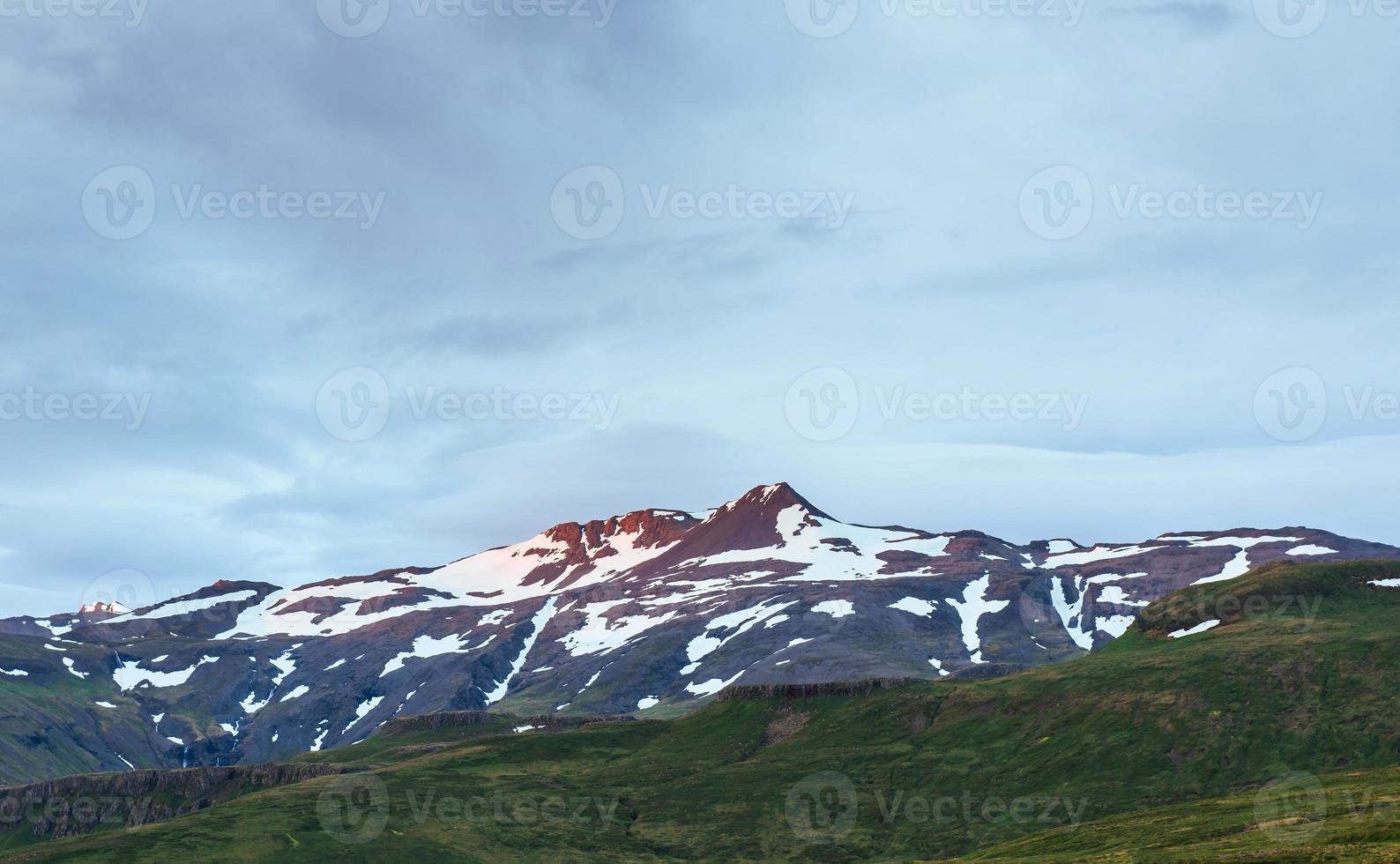 Valley National Park Landmannalaugar. On the gentle slopes of the mountains are snow fields and glaciers. Magnificent Iceland in the summer photo