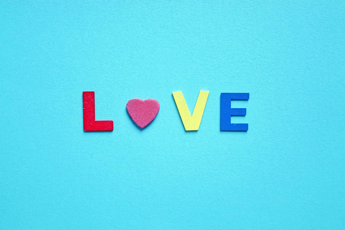 love word on the blue background for valentine's day photo