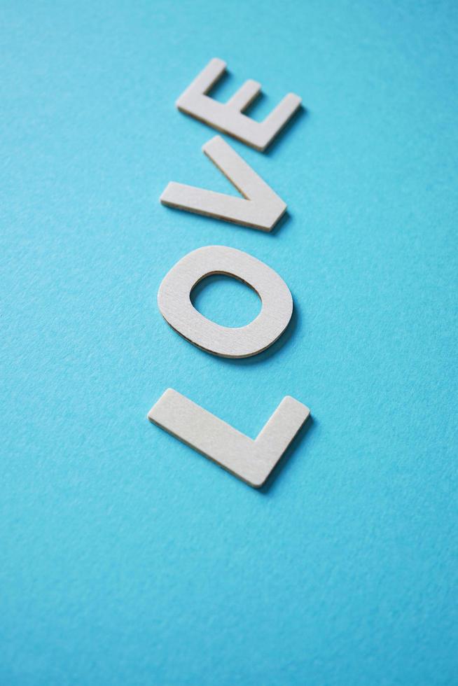 love word on the blue background for valentine's day photo