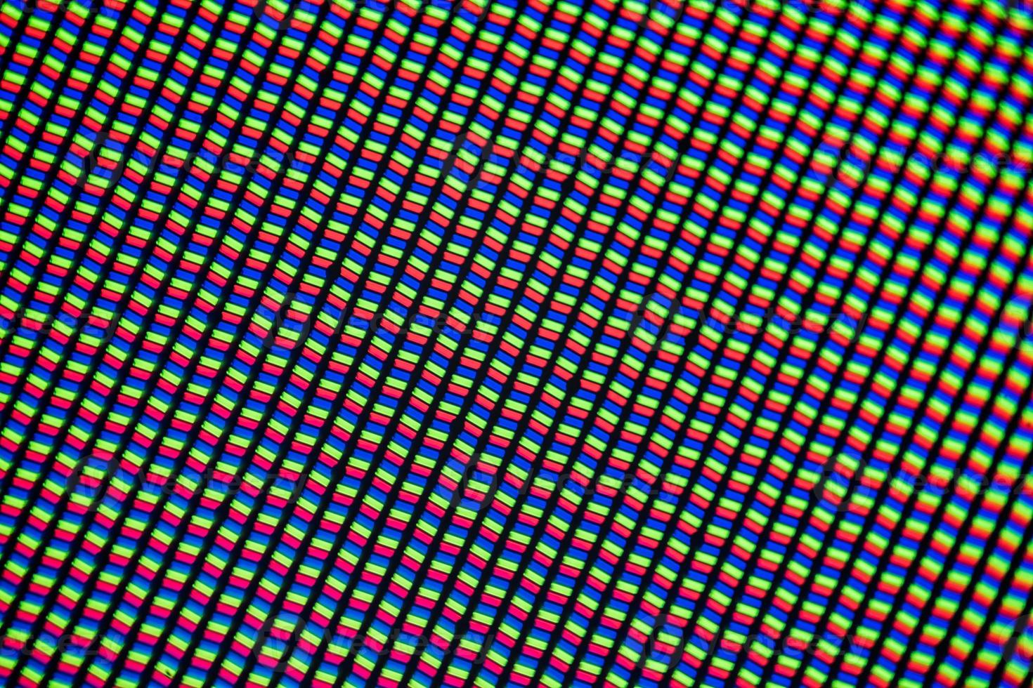 Light photomicrograph of a mobile LCD screen seen through a microscope photo