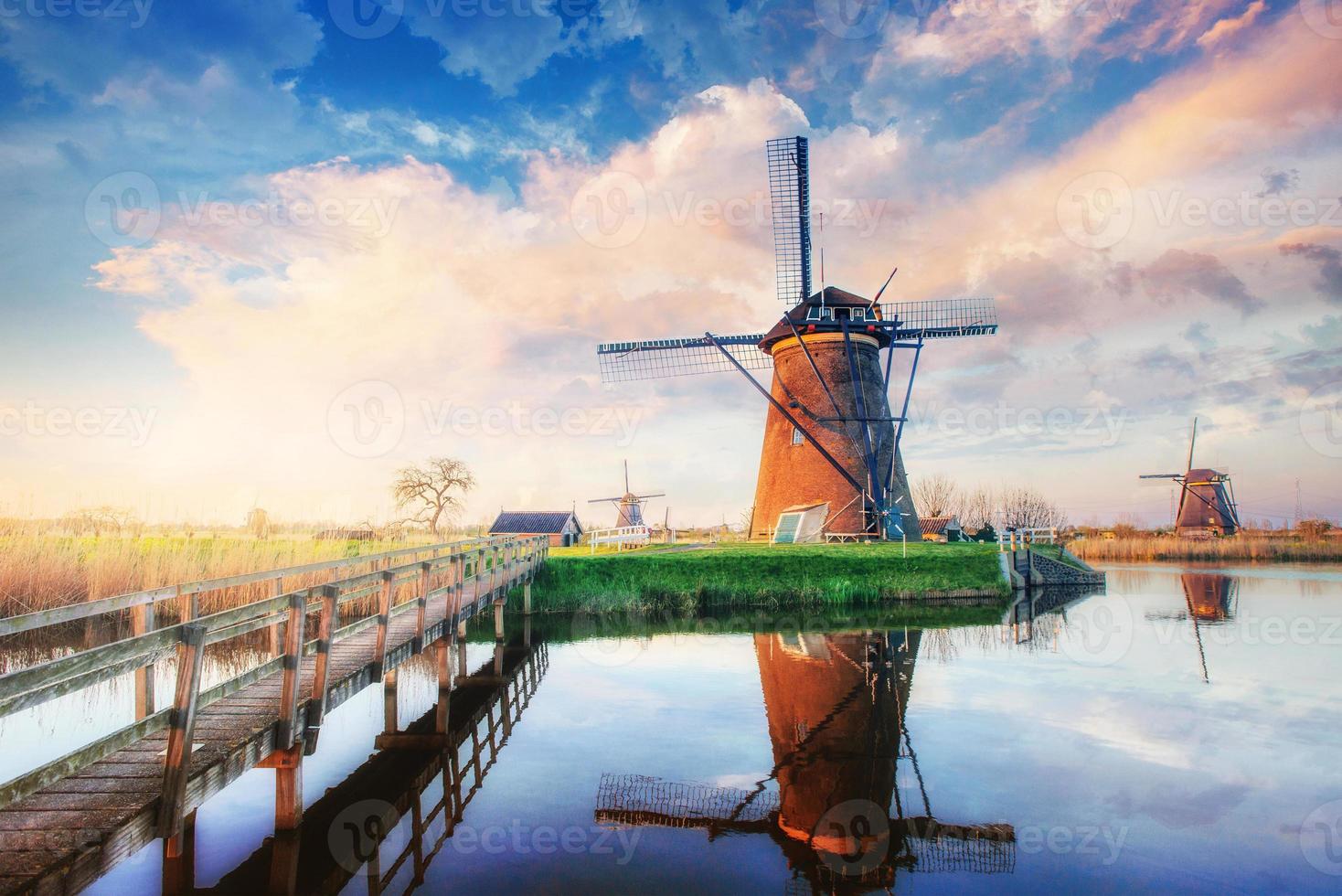 Traditional Dutch windmills from the channel Rotterdam. Holland photo