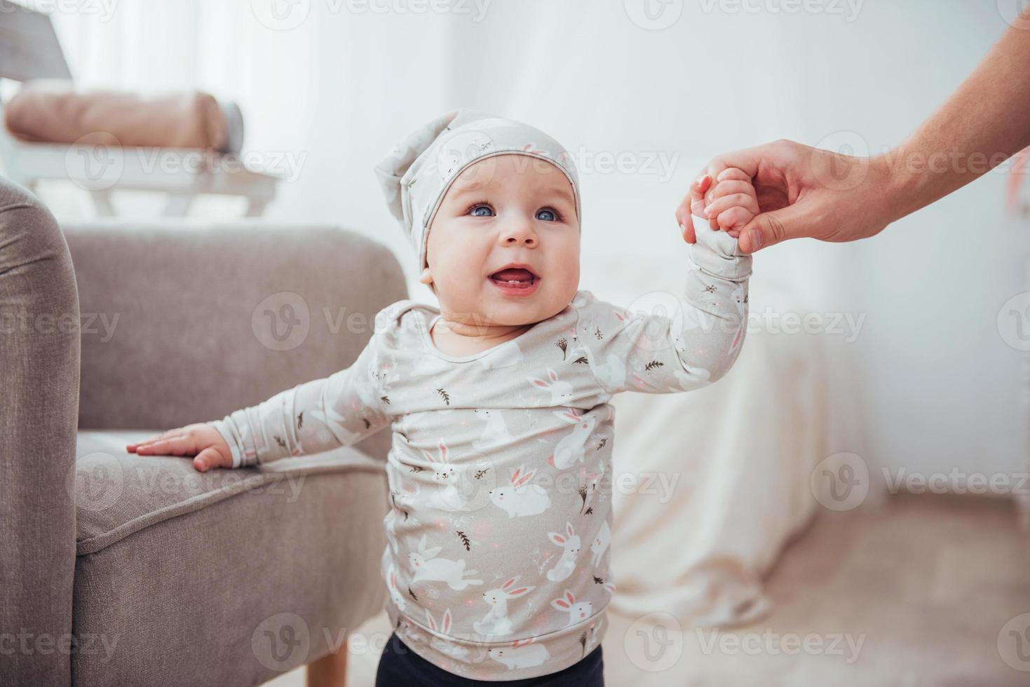 Happy baby chair next to a bright room photo