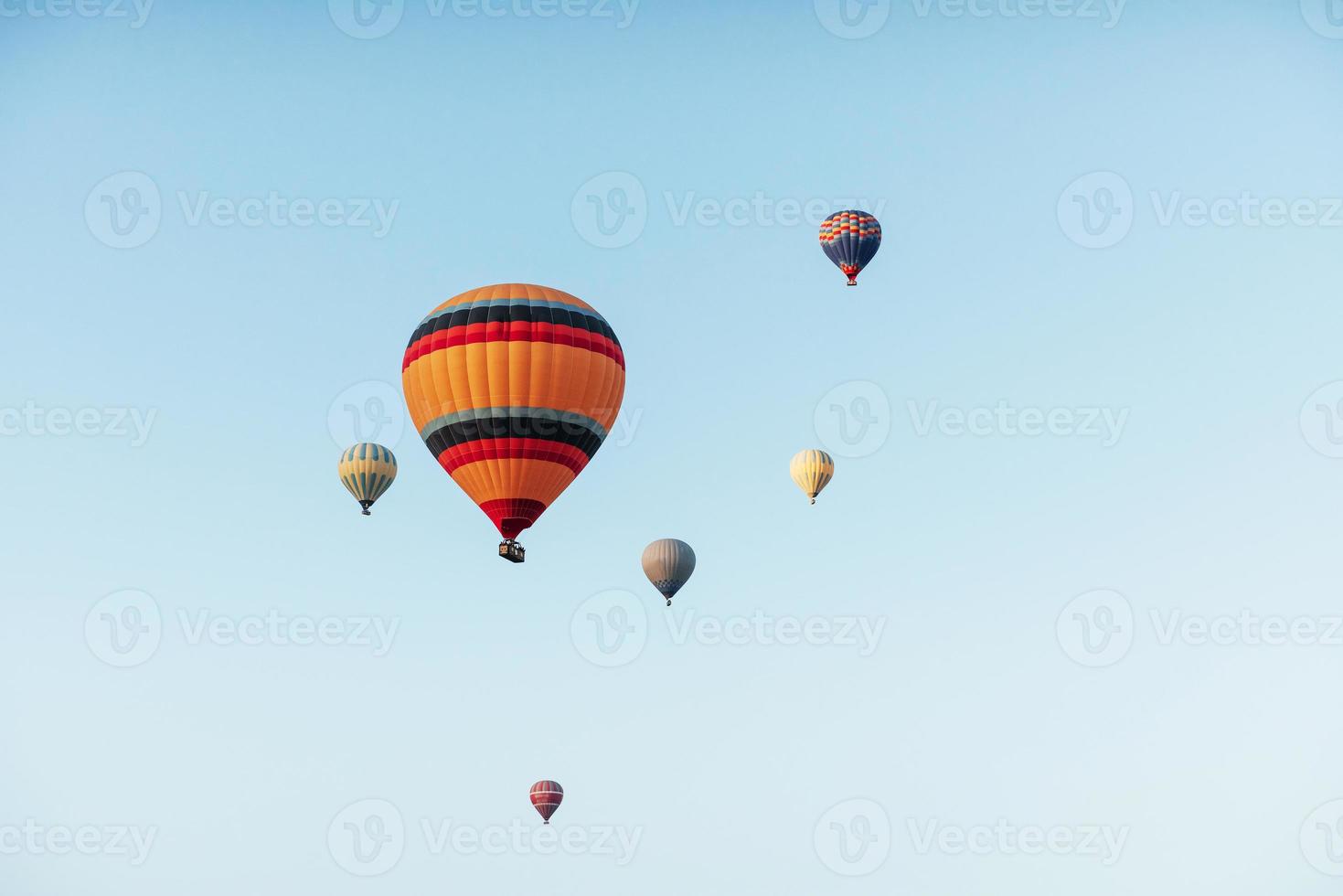 A group of colorful hot air balloons against photo