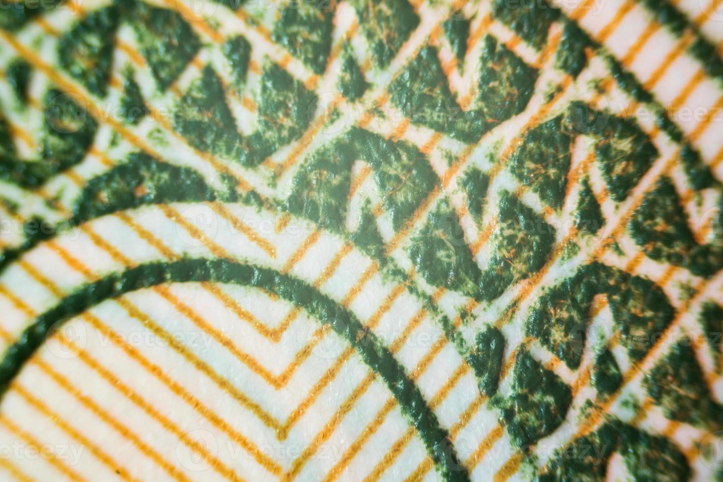 USA money under a microscope partially out of focus, focus point on center photo
