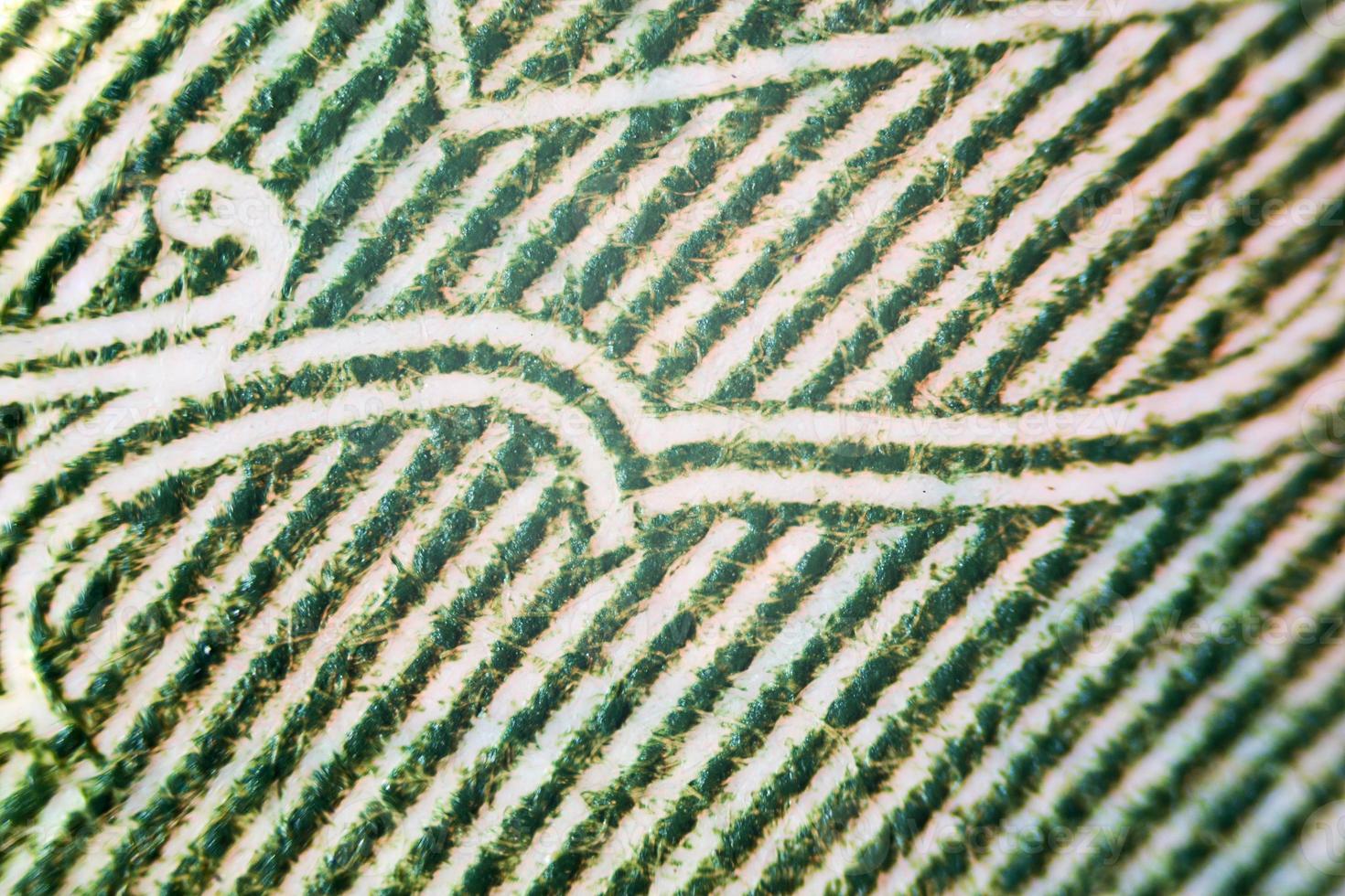 USA money under a microscope partially out of focus, focus point on center photo