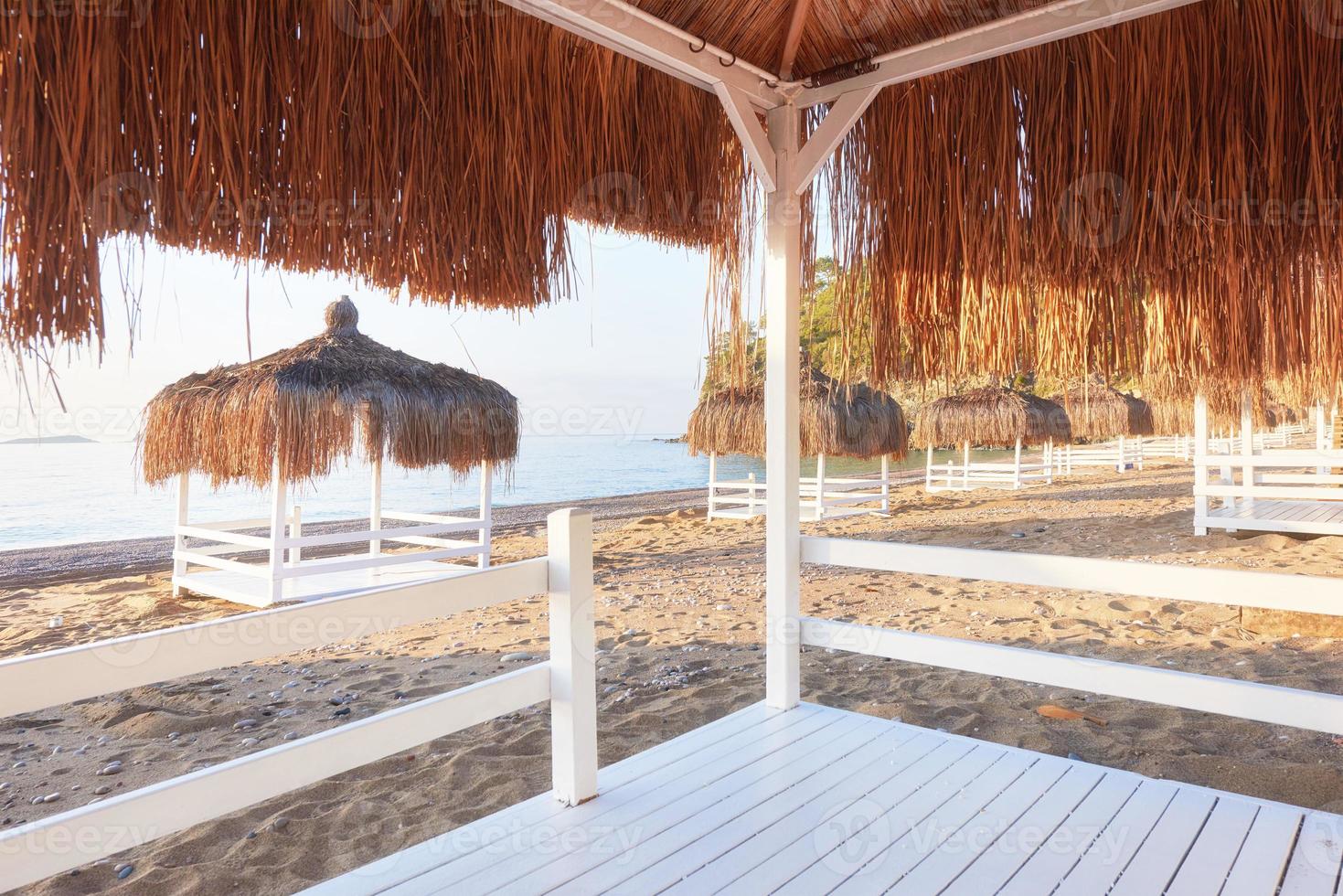 White chairs on the beach resort famous Amara Dolce Vita Luxury Hotel. Resort. Tekirova-Kemer. Turkey. photo