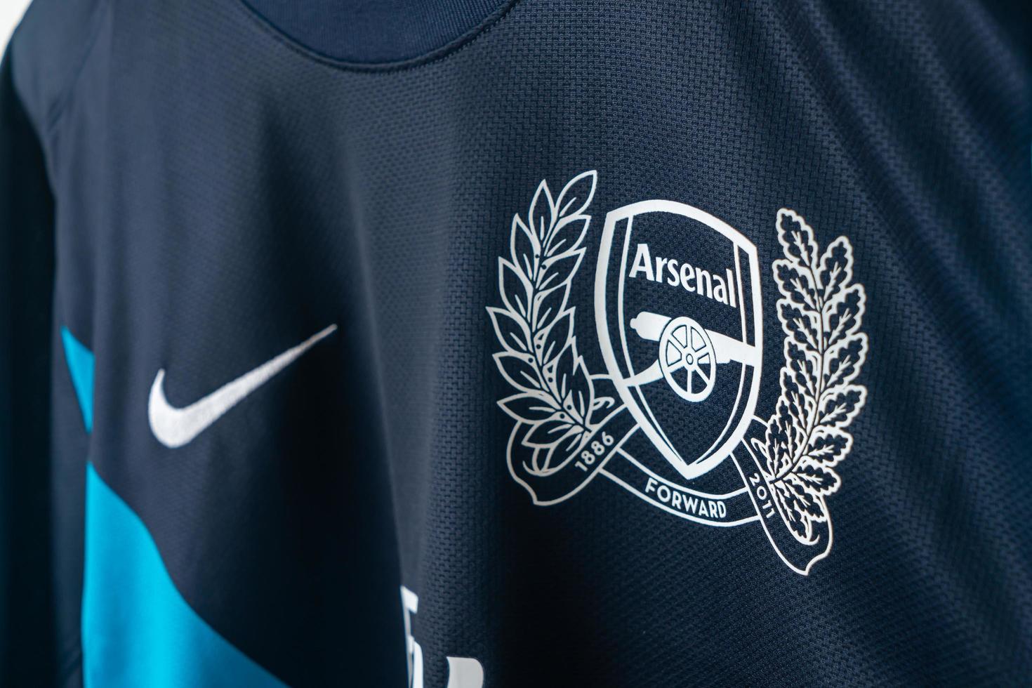 Bangkok, Thailand - Jan 18, 2022 - Arsenal logo on Arsenal retro shirt home jersey season 2008-2010 photo