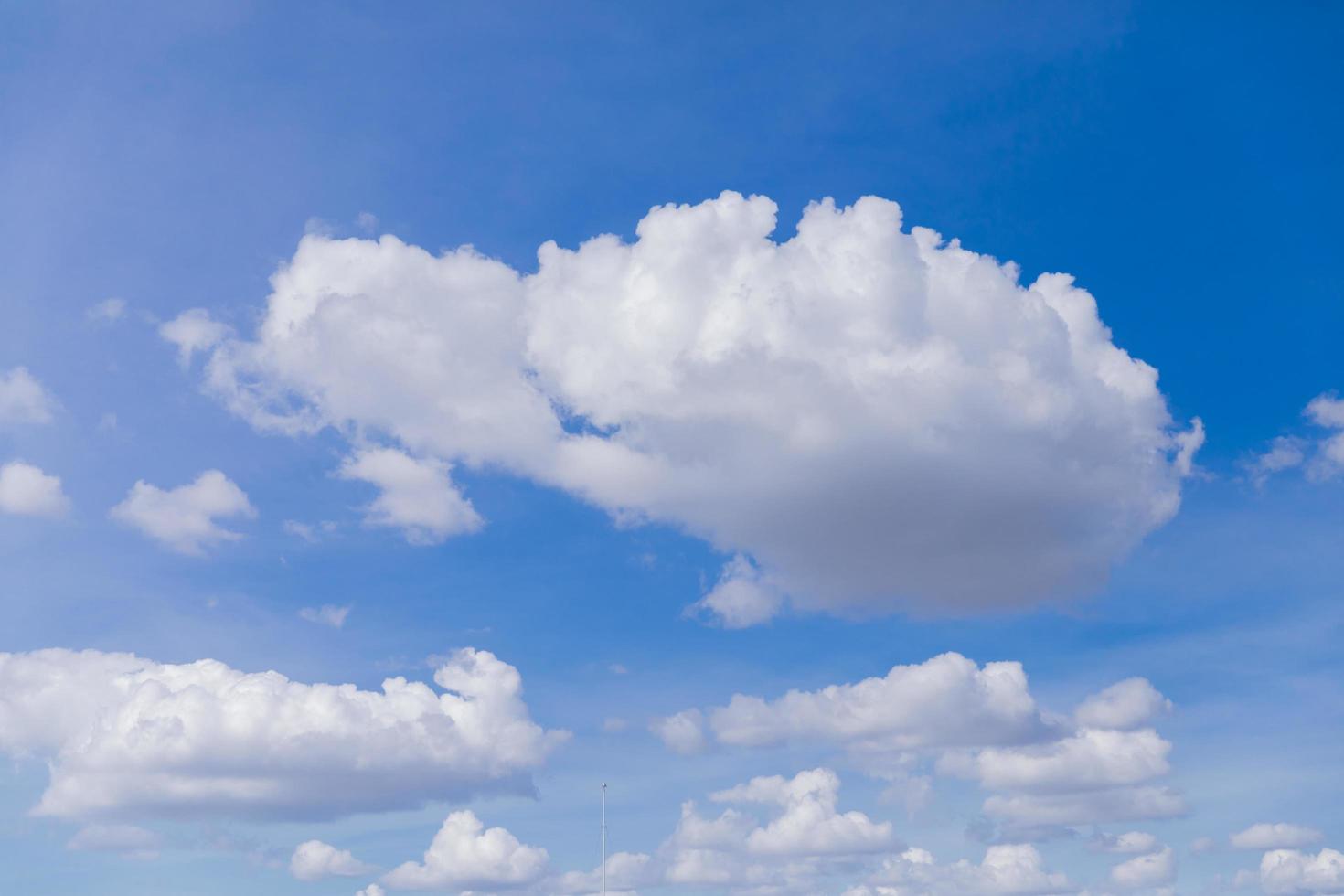 beautiful blue sky background with white clouds photo