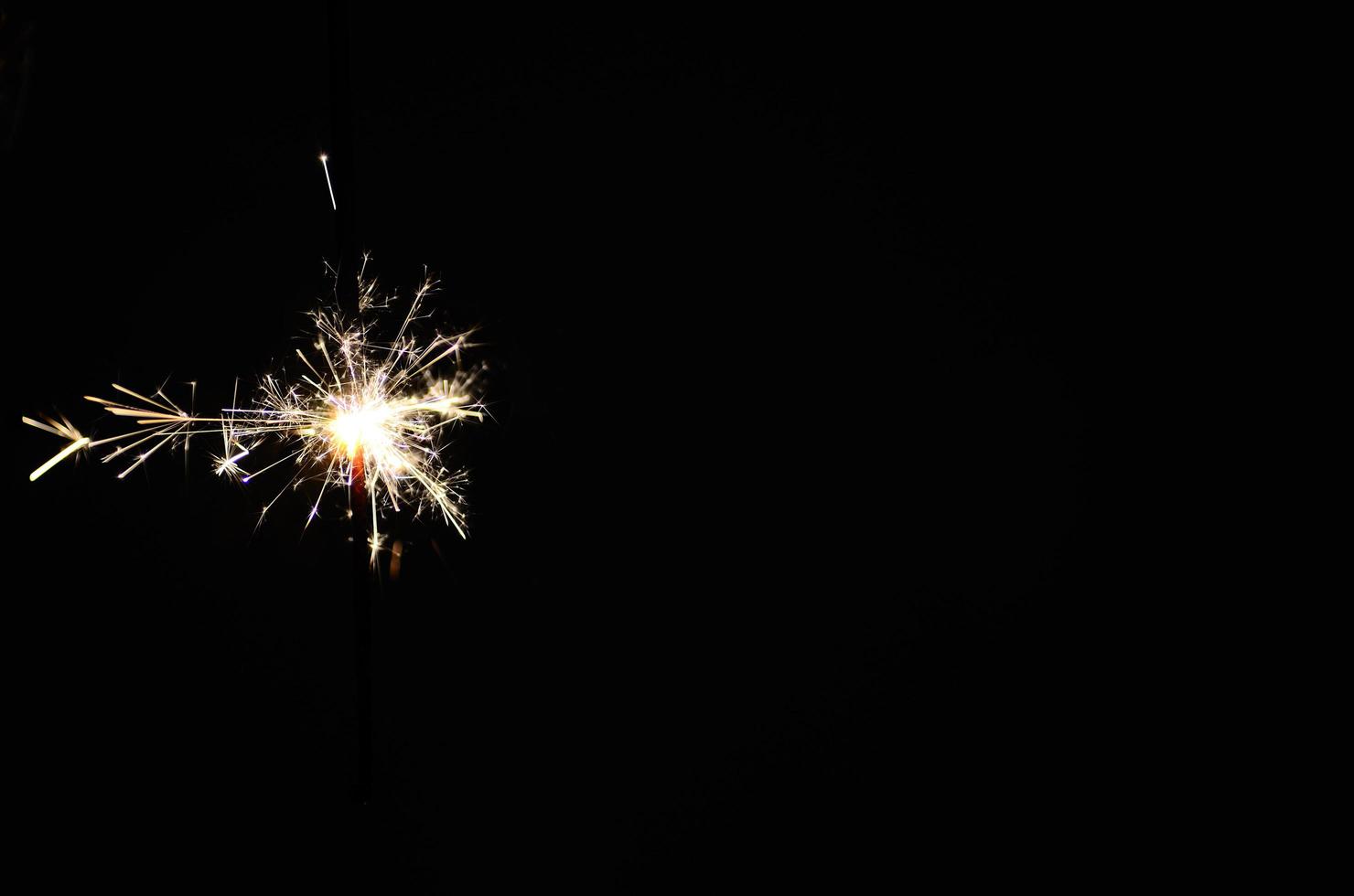 sparkler on black photo