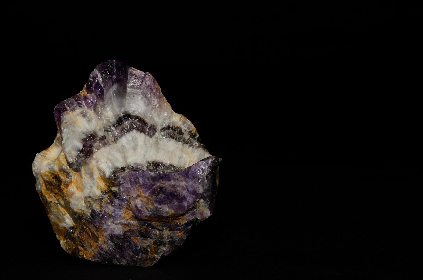 amethyst mineral and black background photo