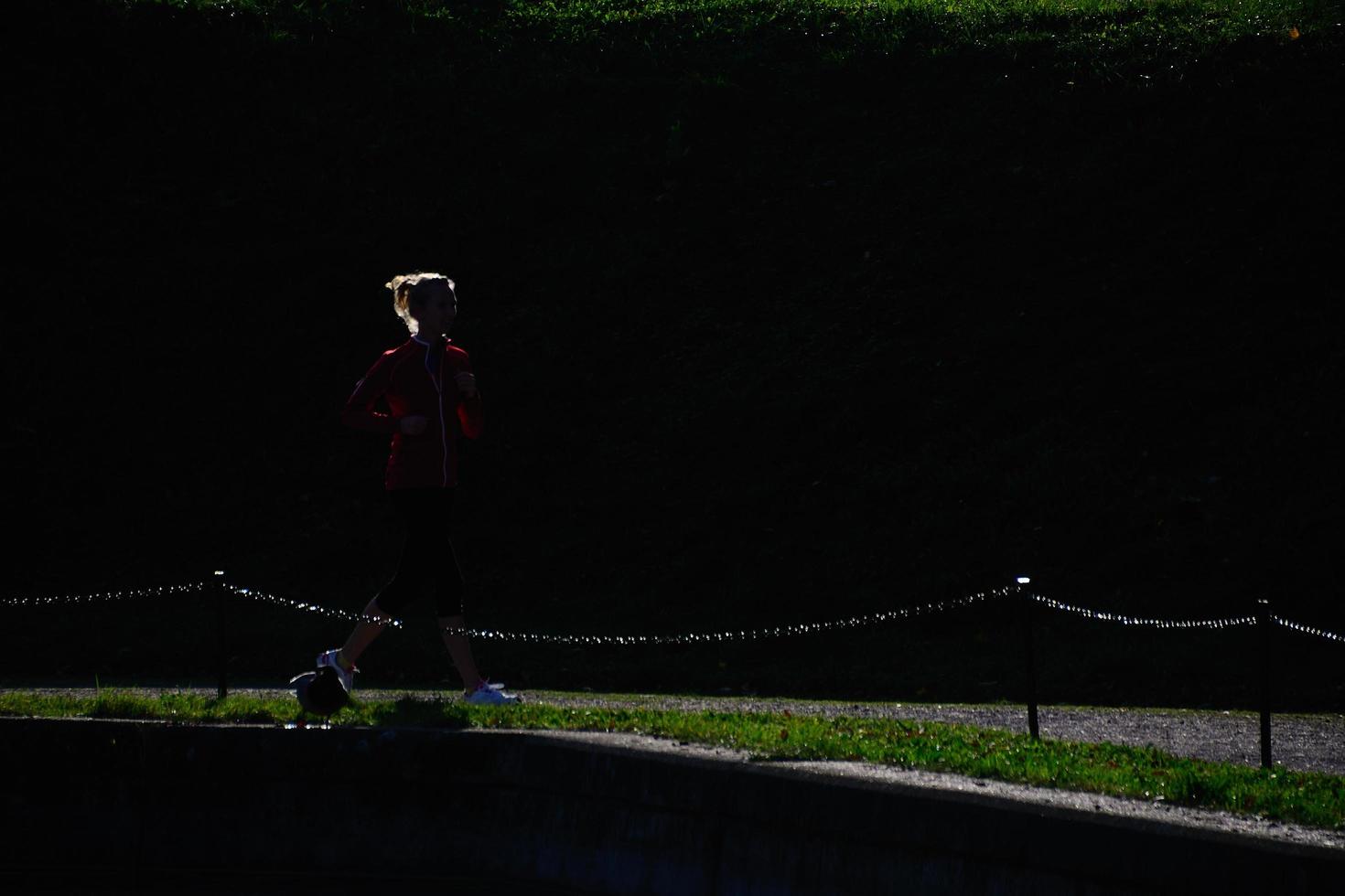 sporty woman while running photo