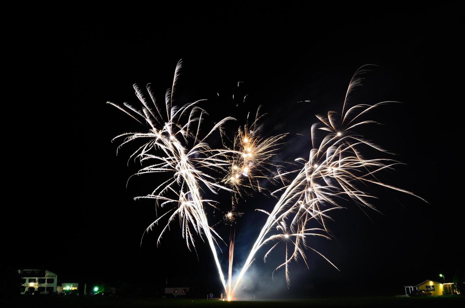 huge fireworks in the night on a party photo