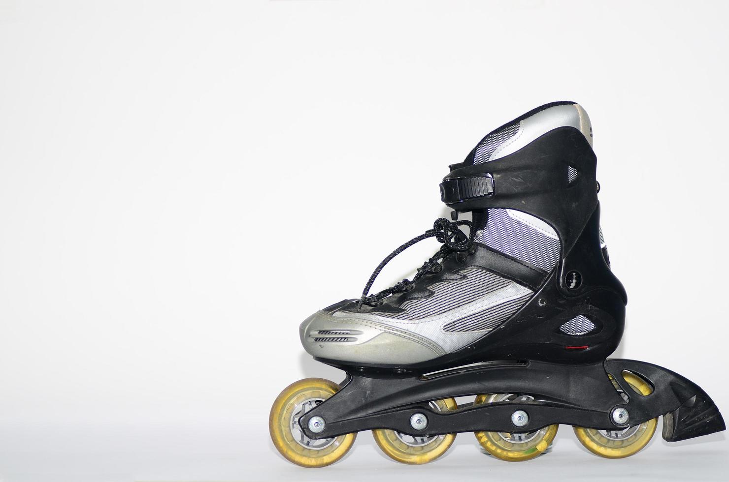 rollerskates in gray and black photo