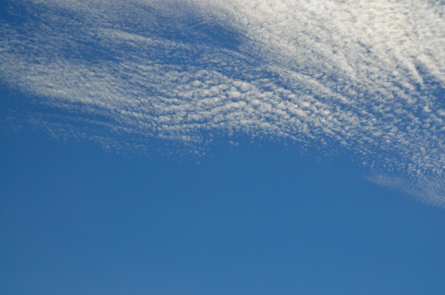 white clouds and blue sky photo