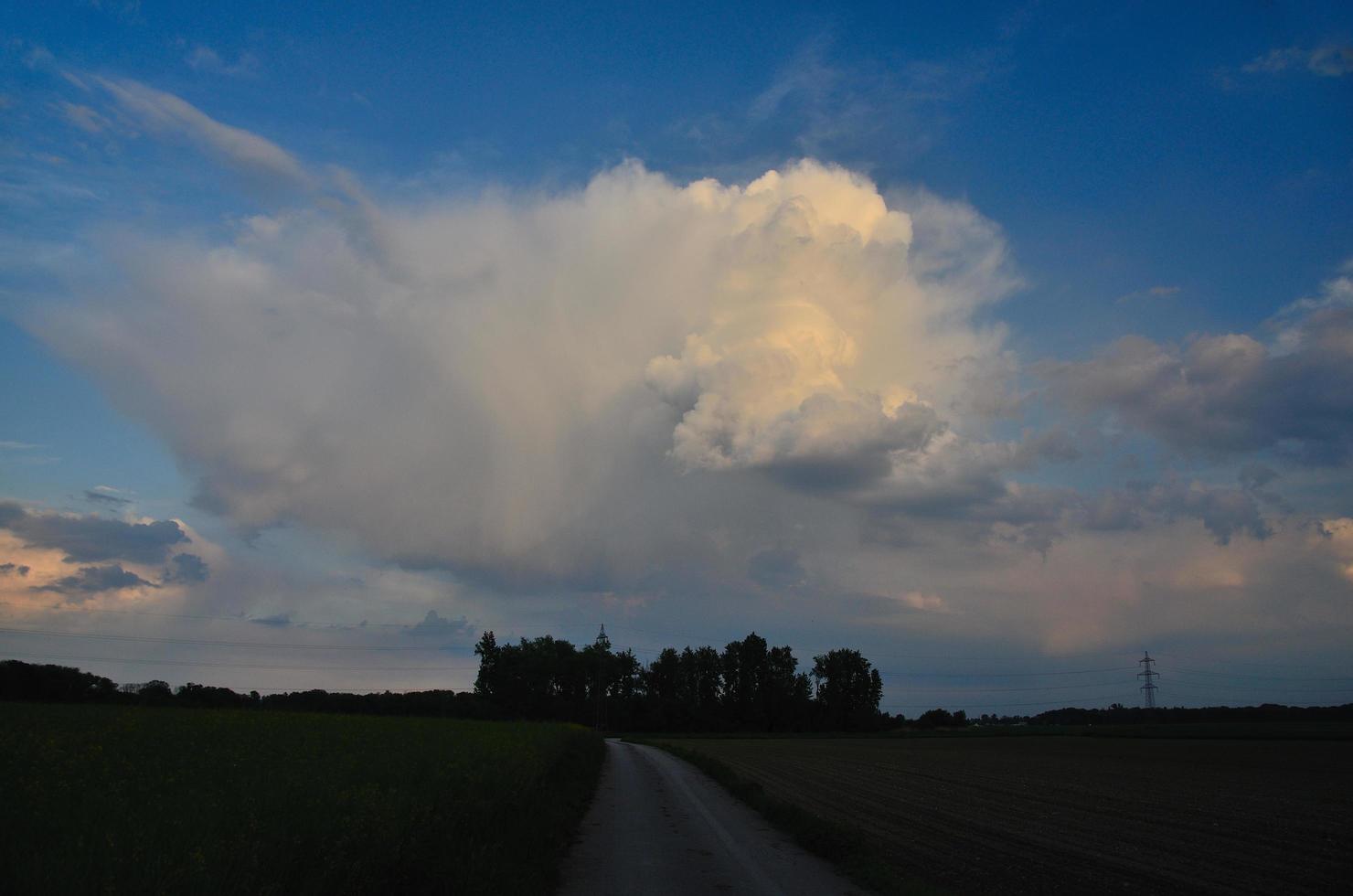 big cloud and landscape photo