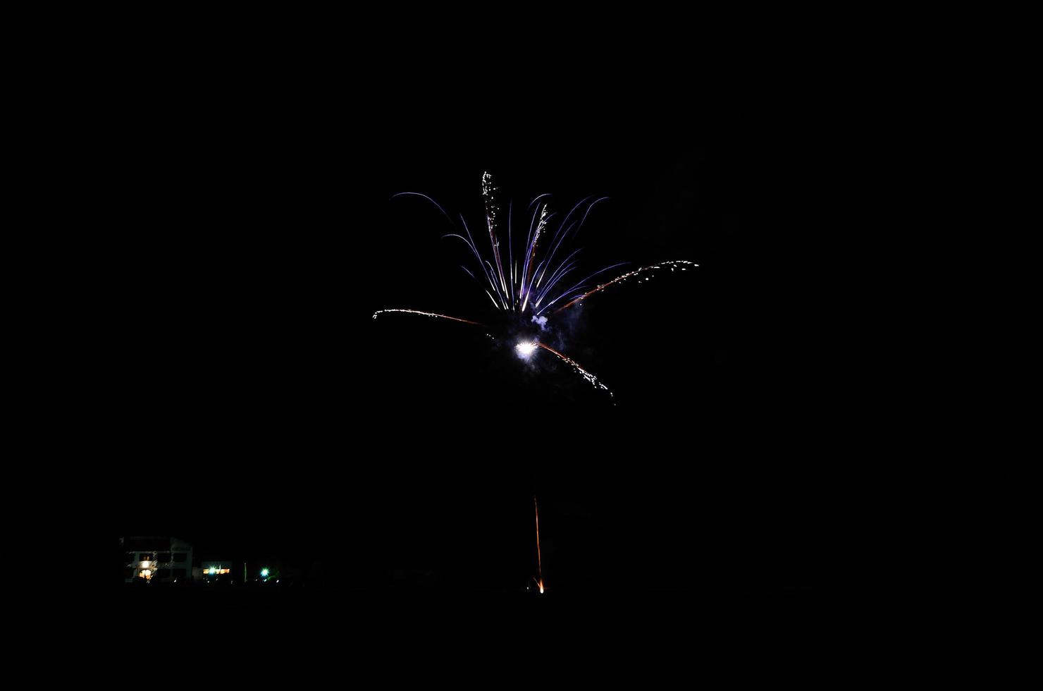 small fireworks in the night on a party photo