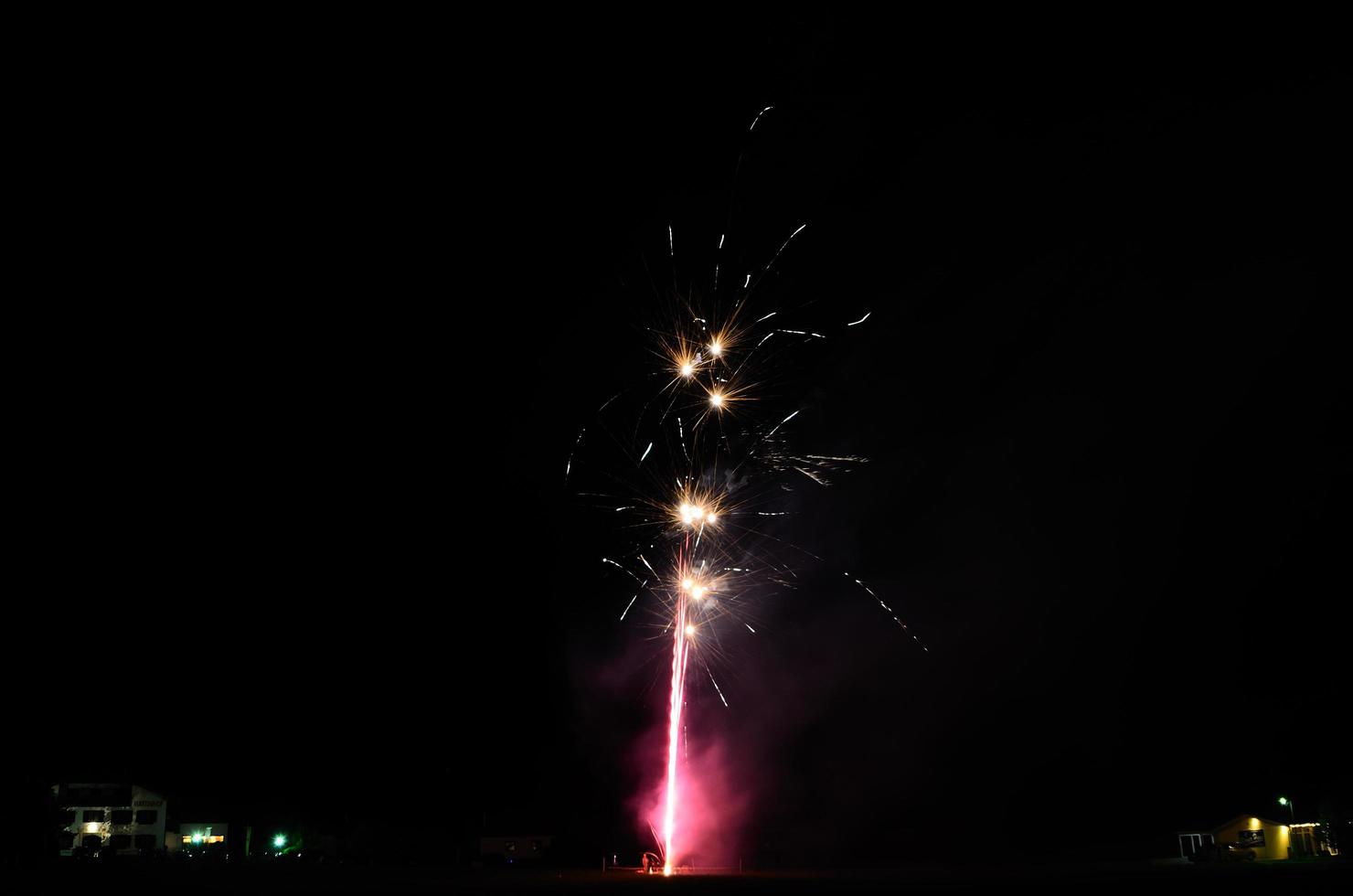 small bright firework in night photo