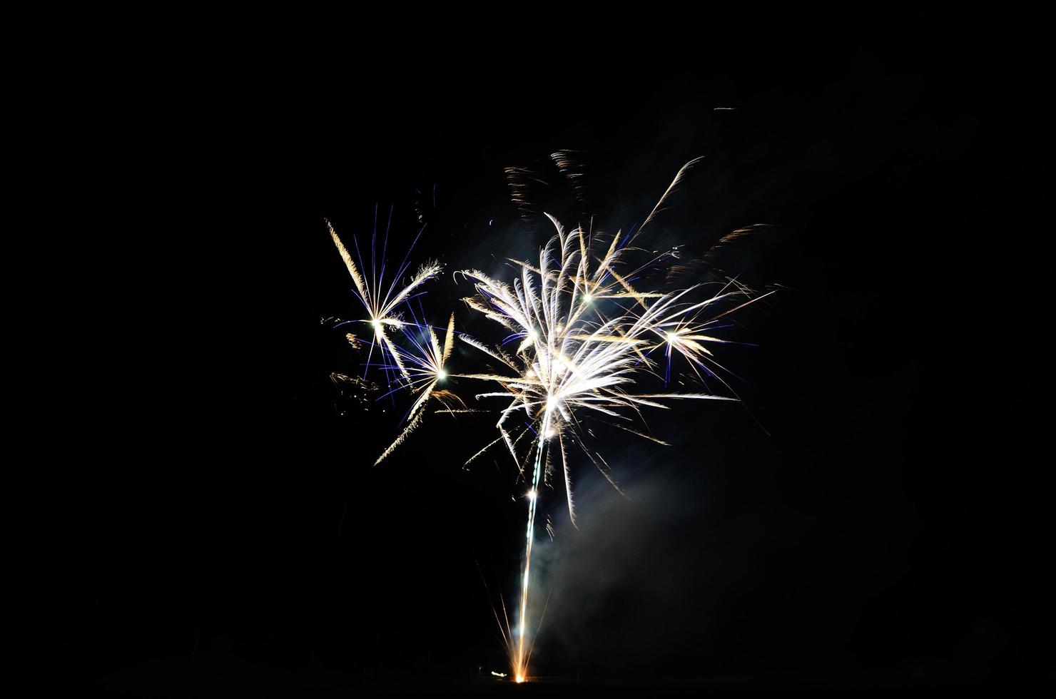 luminous fireworks in the night on a party photo