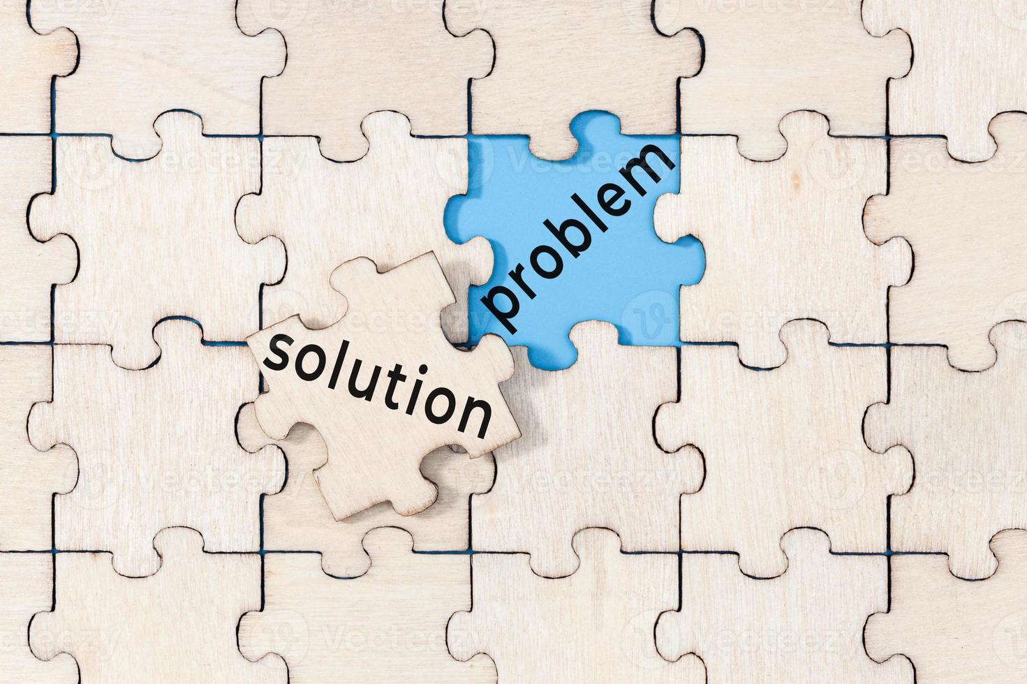 Solution to the problem concept. Puzzle with text photo