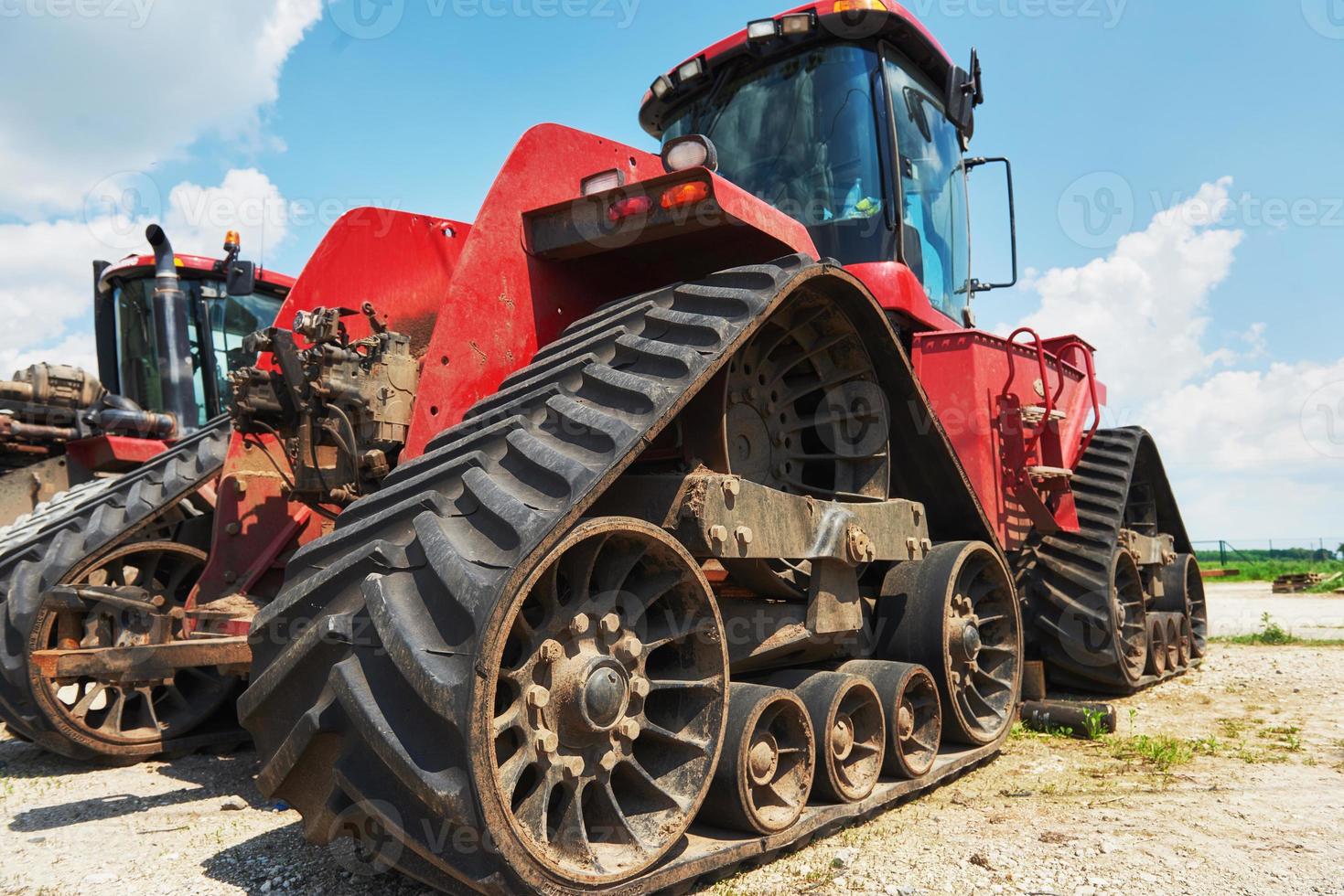 Harvesters and combine parts at the plant are waiting for sales, tractors and agricultural machinery, maintenance and exports photo