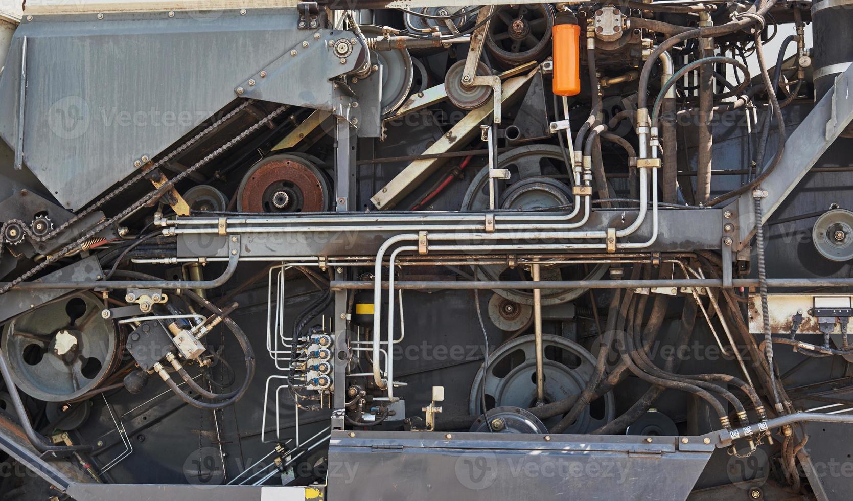 Harvesters and combine parts at the plant are waiting for sales, tractors and agricultural machinery, maintenance and exports photo