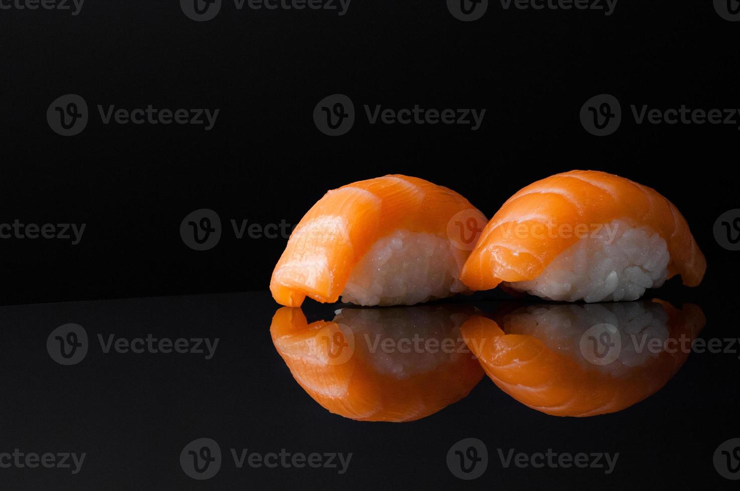 sushi on black background photo