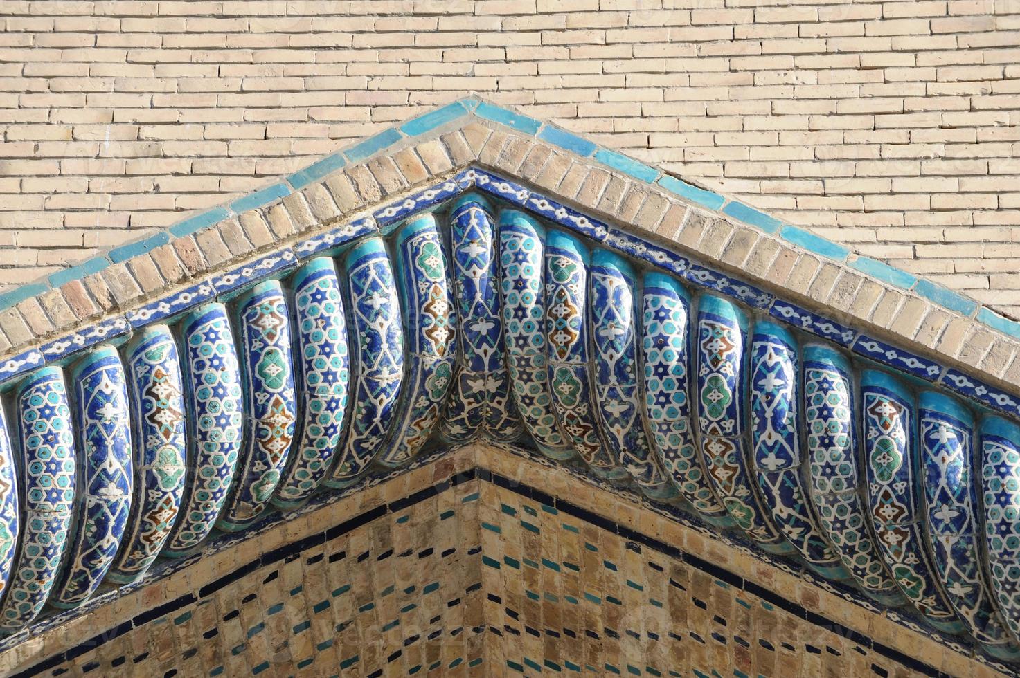 Elements of ancient architecture of Central Asia. Ceiling in the form of a dome in a traditional ancient Asian mosaic photo