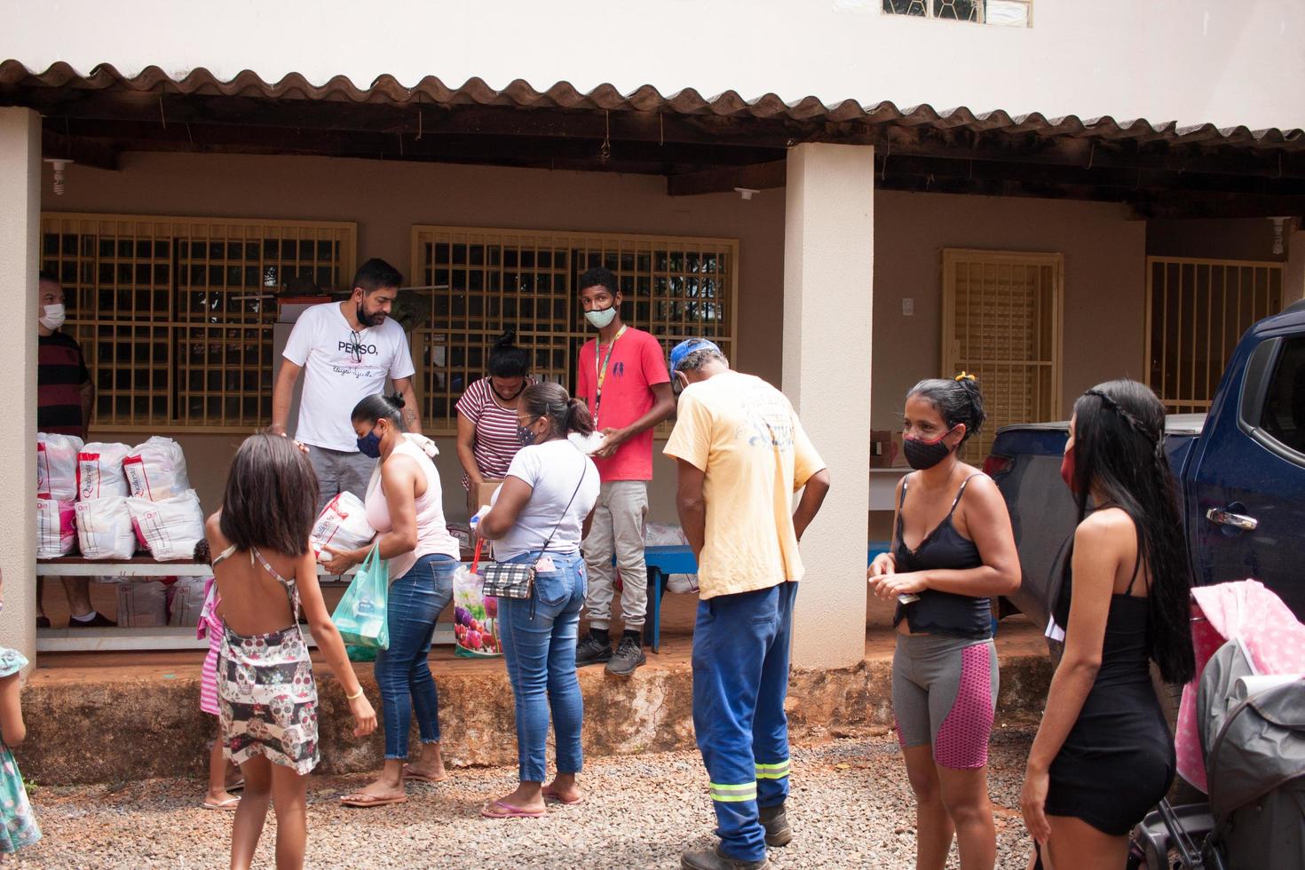 Planaltina, Brazil, 2-26-22-Local feeding center handing out food photo