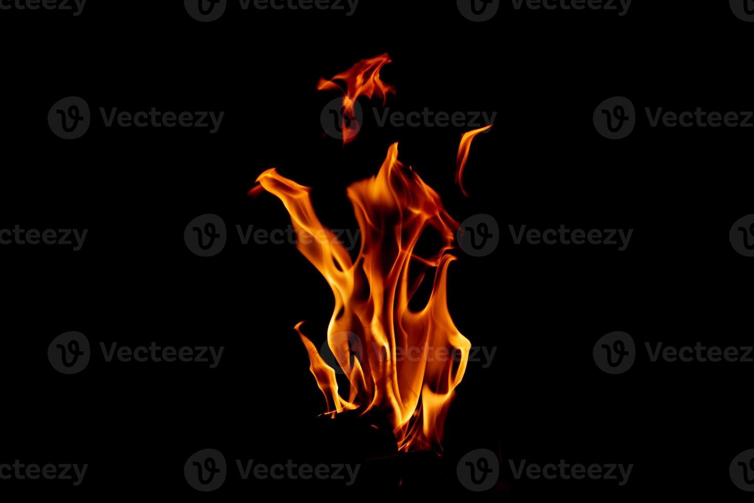 Fire flame texture. Burning material backdrop. Burn effect pattern. Blaze and torch wallpaper. Heat and haze backdrop. photo