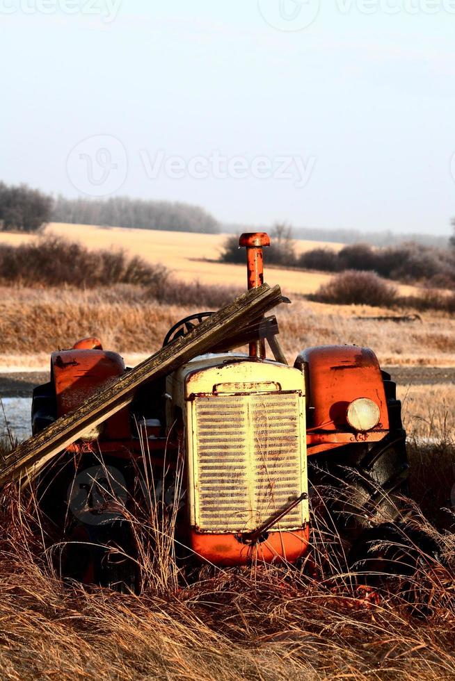 Old abandoned tractor photo