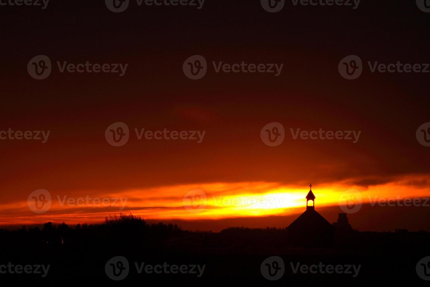 Sunrise behind Saint Columba Church in Saskatchewan photo
