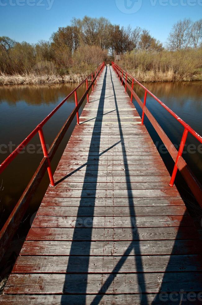 Wooden bridge across to island at Grand Beach photo