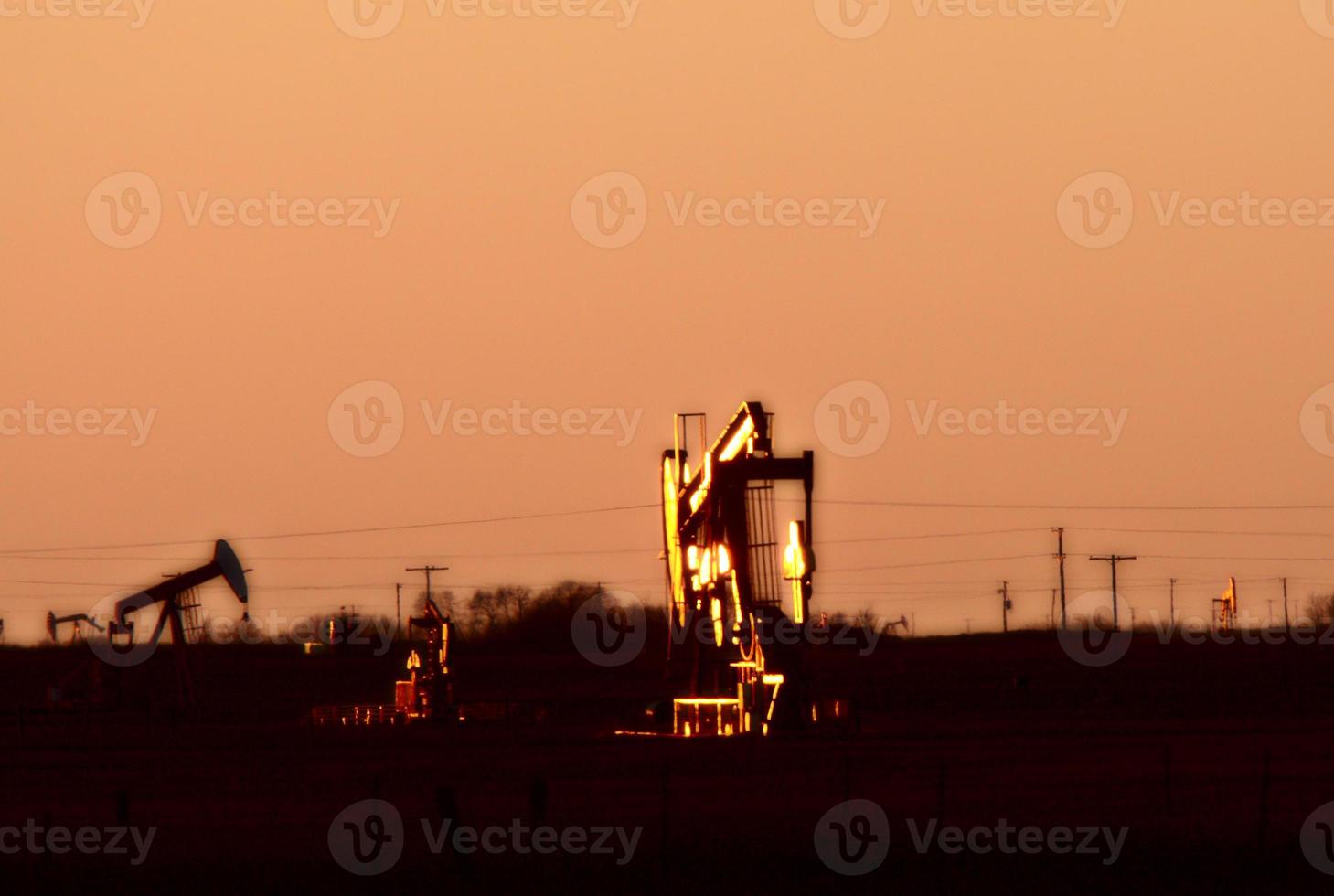 Oil pumps in Saskatchewan field photo